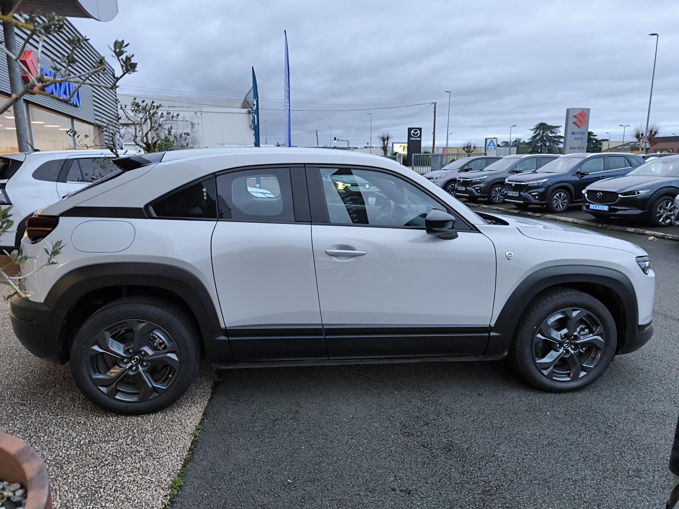 MAZDA MX-30 R-EV e-Skyactiv 170 ch BVA Prime-Line - Véhicule Occasion - Océane Auto MAZDA MX-30 R-EV e-Skyactiv 170 ch BVA Prime-Line - Véhicule Occasion Océane Auto