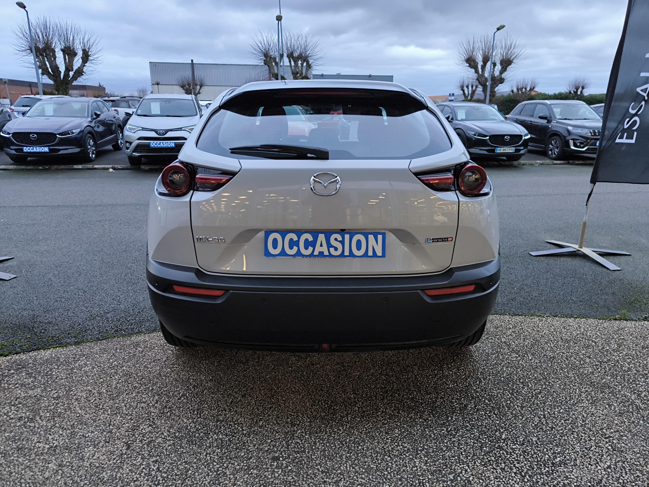 MAZDA MX-30 R-EV e-Skyactiv 170 ch BVA Prime-Line - Véhicule Occasion - Océane Auto MAZDA MX-30 R-EV e-Skyactiv 170 ch BVA Prime-Line - Véhicule Occasion Océane Auto
