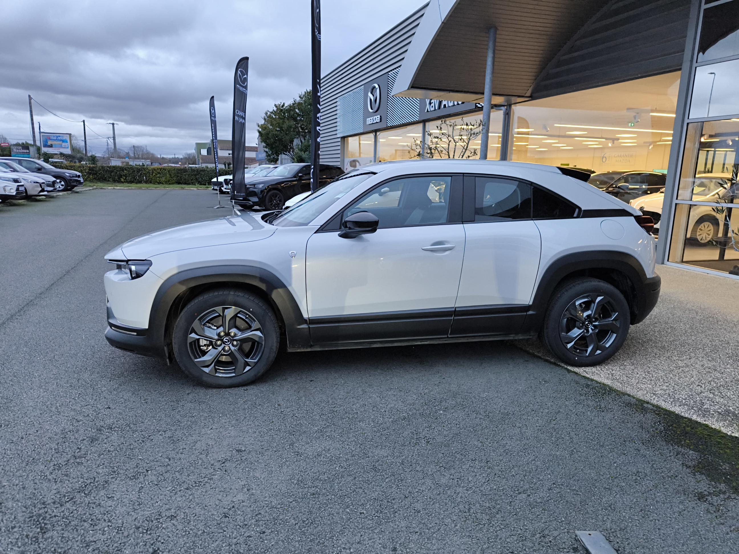 MAZDA MX-30 R-EV e-Skyactiv 170 ch BVA Prime-Line - Véhicule Occasion - Océane Auto MAZDA MX-30 R-EV e-Skyactiv 170 ch BVA Prime-Line - Véhicule Occasion Océane Auto