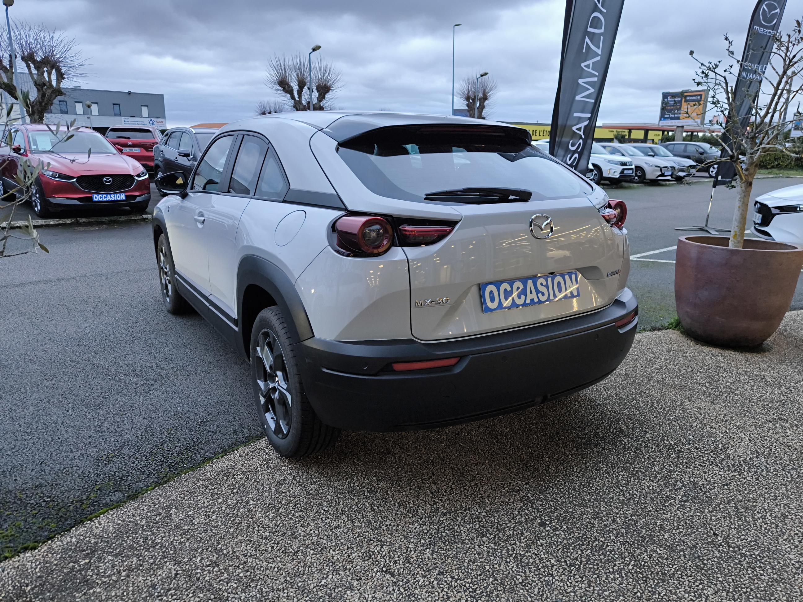 MAZDA MX-30 R-EV e-Skyactiv 170 ch BVA Prime-Line - Véhicule Occasion - Océane Auto MAZDA MX-30 R-EV e-Skyactiv 170 ch BVA Prime-Line - Véhicule Occasion Océane Auto