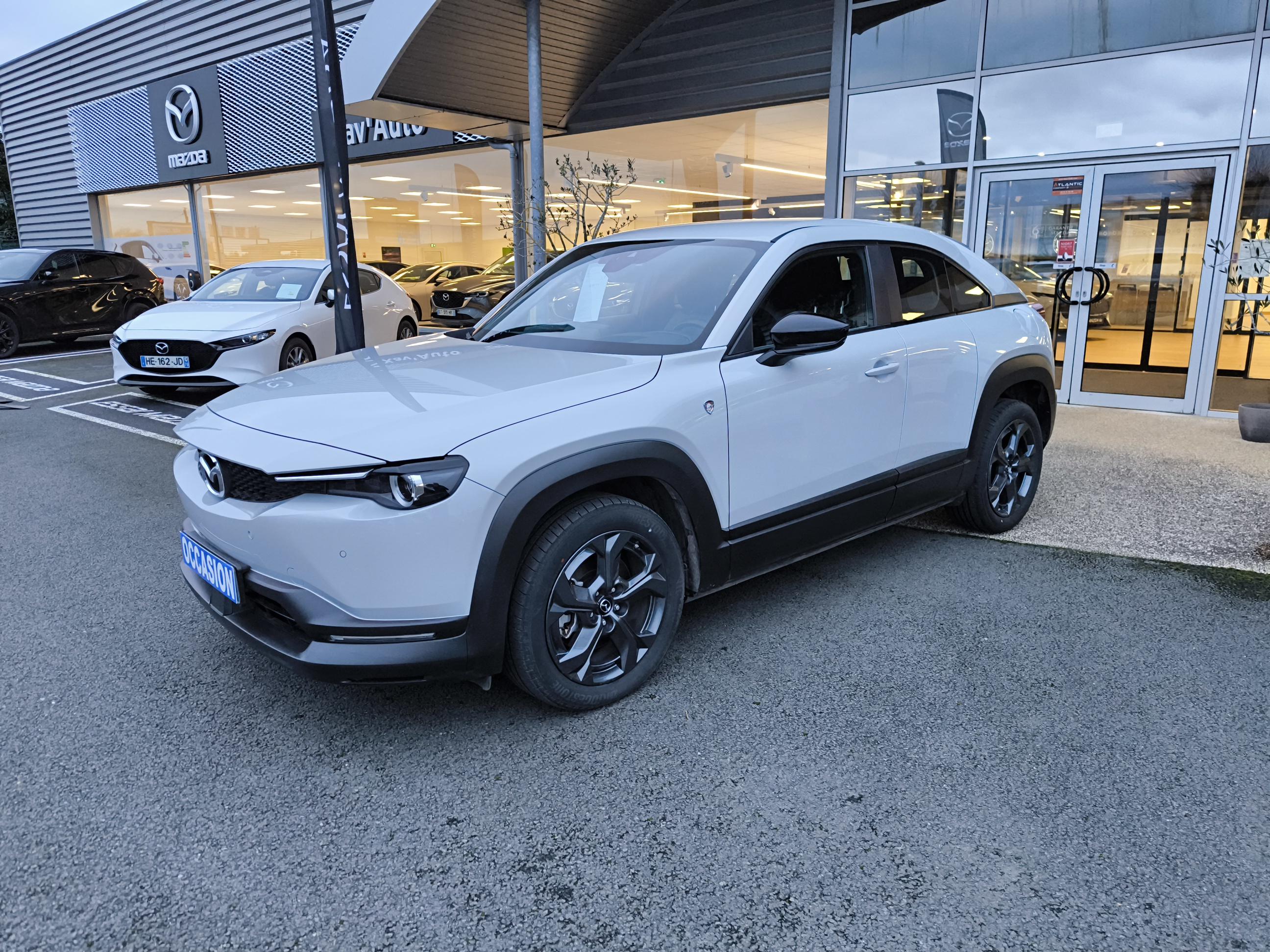 MAZDA MX-30 R-EV e-Skyactiv 170 ch BVA Prime-Line - Véhicule Occasion - Océane Auto MAZDA MX-30 R-EV e-Skyactiv 170 ch BVA Prime-Line - Véhicule Occasion Océane Auto
