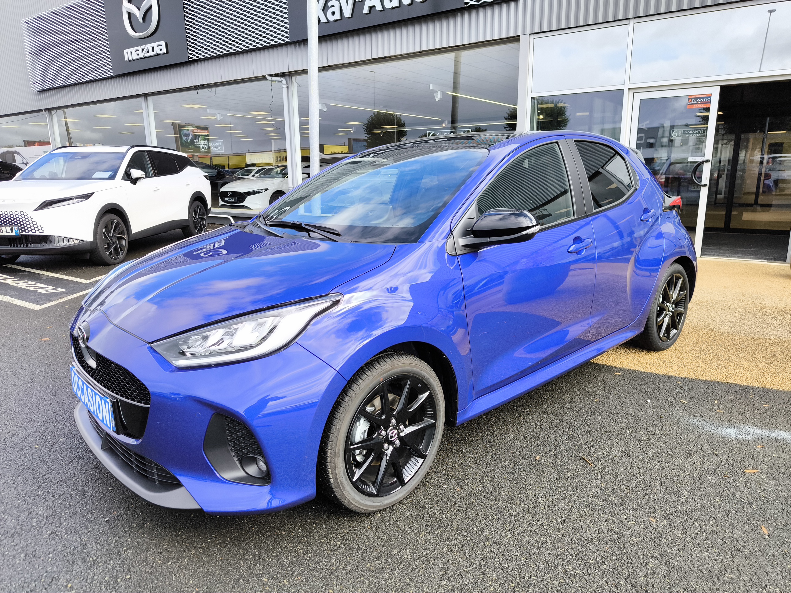 MAZDA Mazda2 Hybrid 1.5L CVT 116 ch Homura Plus - Véhicule Occasion - Océane Auto MAZDA Mazda2 Hybrid 1.5L CVT 116 ch Homura Plus - Véhicule Occasion Océane Auto