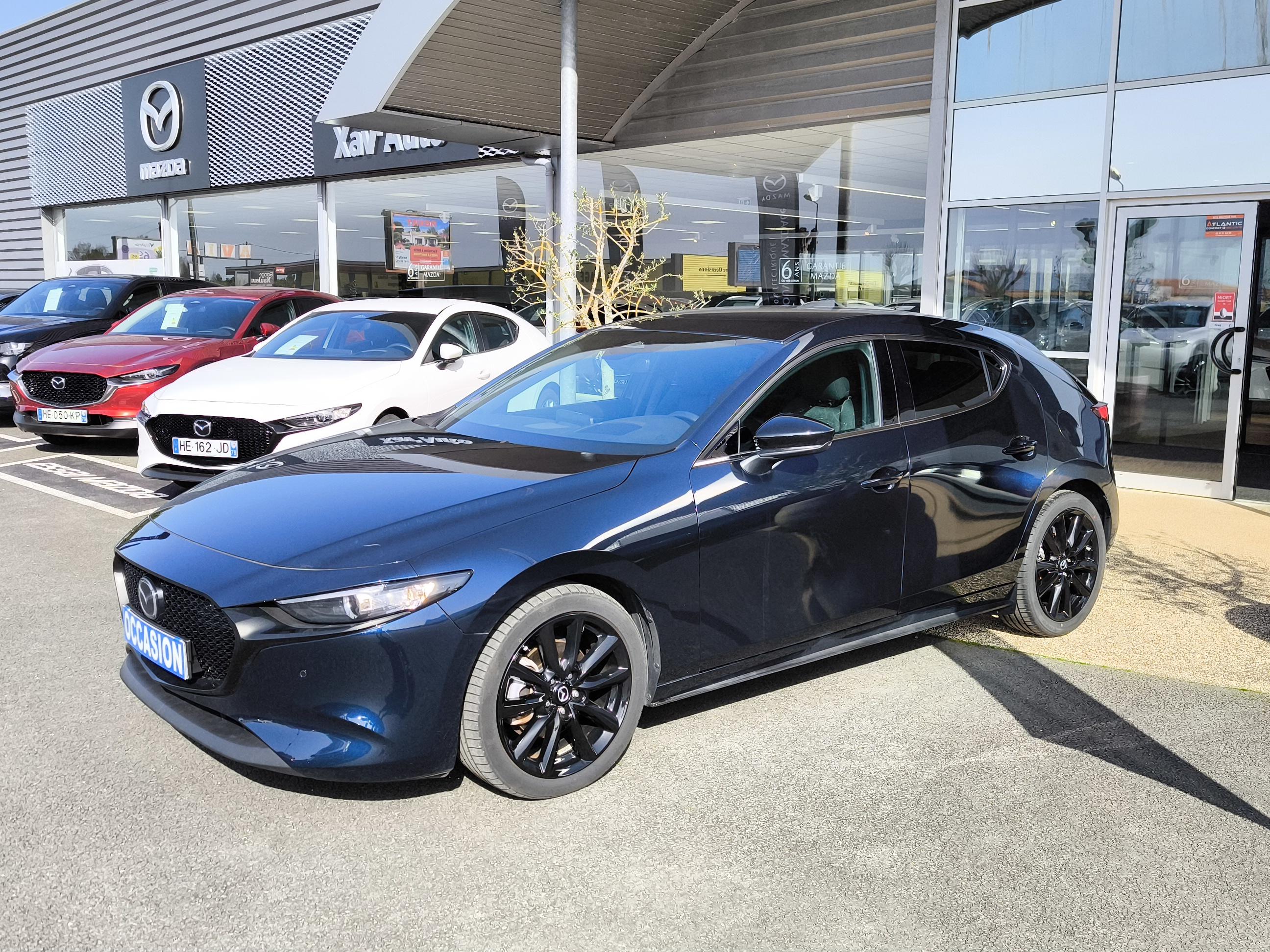 MAZDA Mazda3 5 portes 2.0L e-SKYACTIV-X M Hybrid 186 ch BVM6 Homura - Véhicule Occasion - Océane Auto MAZDA Mazda3 5 portes 2.0L e-SKYACTIV-X M Hybrid 186 ch BVM6 Homura - Véhicule Occasion Océane Auto