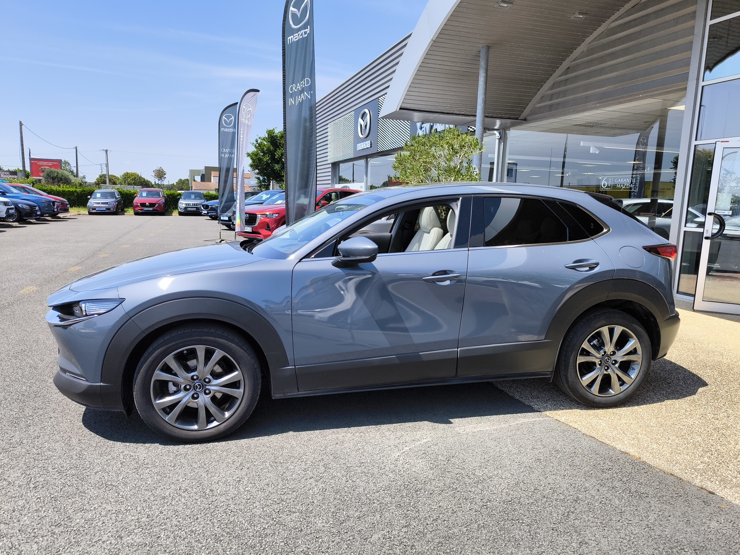 MAZDA CX-30 2.0L e-SKYACTIV X M Hybrid 186 ch 4x2 BVA6 Exclusive Cuir Pure-White - Véhicule Occasion Océane Auto