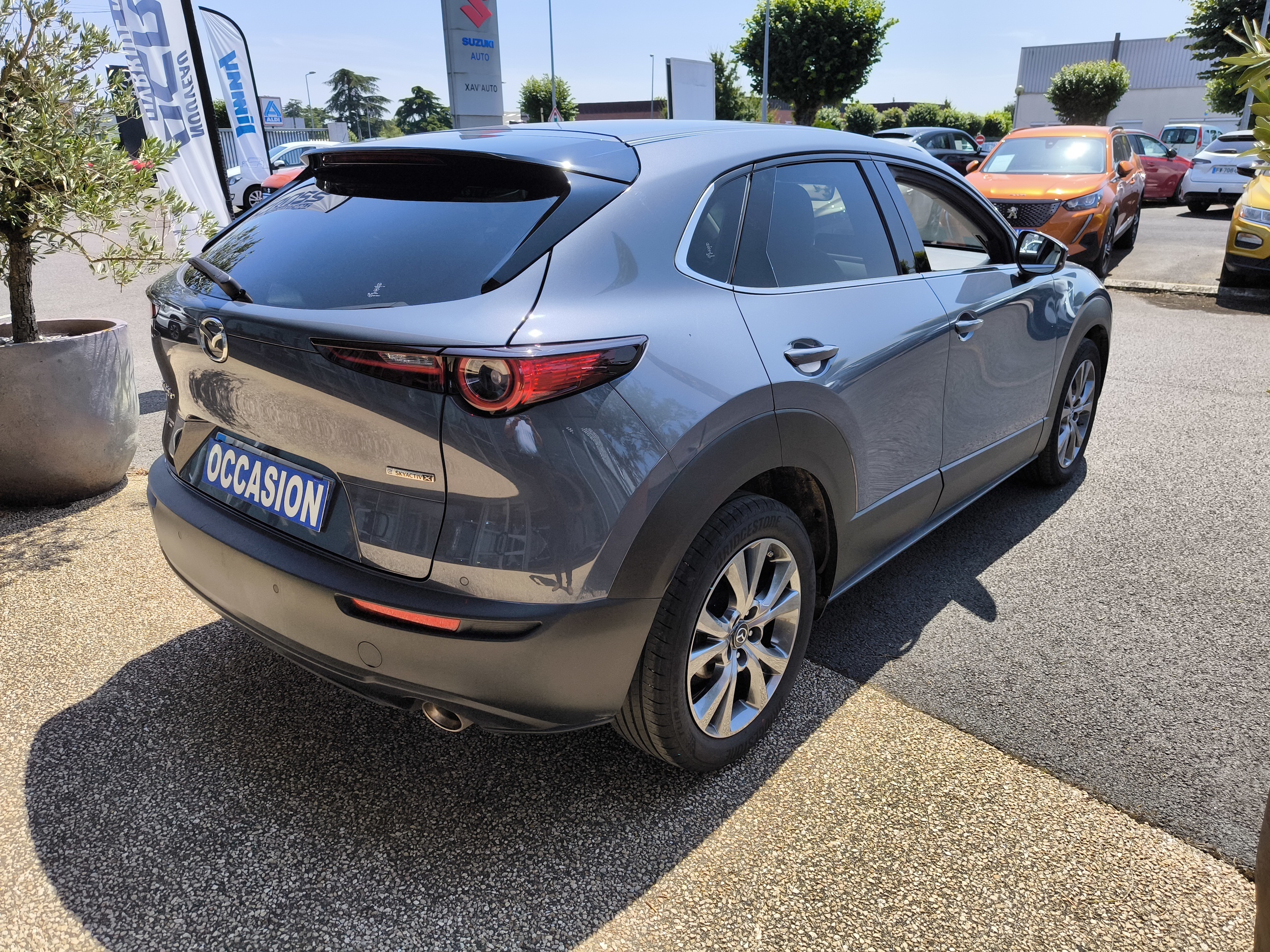 MAZDA CX-30 2.0L e-SKYACTIV X M Hybrid 186 ch 4x2 BVA6 Exclusive Cuir Pure-White - Véhicule Occasion - Océane Auto MAZDA CX-30 2.0L e-SKYACTIV X M Hybrid 186 ch 4x2 BVA6 Exclusive Cuir Pure-White - Véhicule Occasion Océane Auto