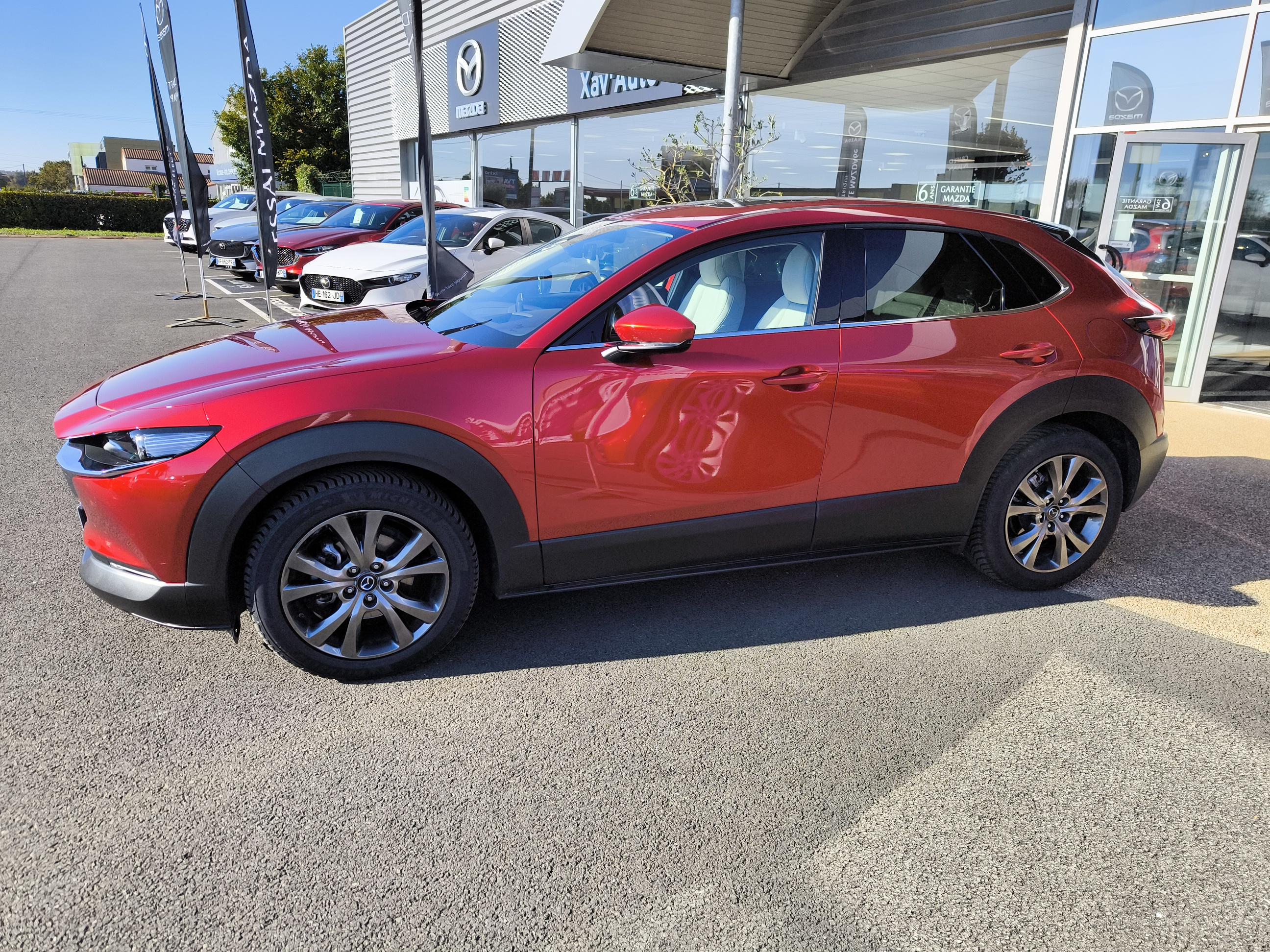 MAZDA CX-30 2.0L e-SKYACTIV X M Hybrid 186 ch 4x4 BVA6 Exclusive-Line - Véhicule Occasion - Océane Auto MAZDA CX-30 2.0L e-SKYACTIV X M Hybrid 186 ch 4x4 BVA6 Exclusive-Line - Véhicule Occasion Océane Auto