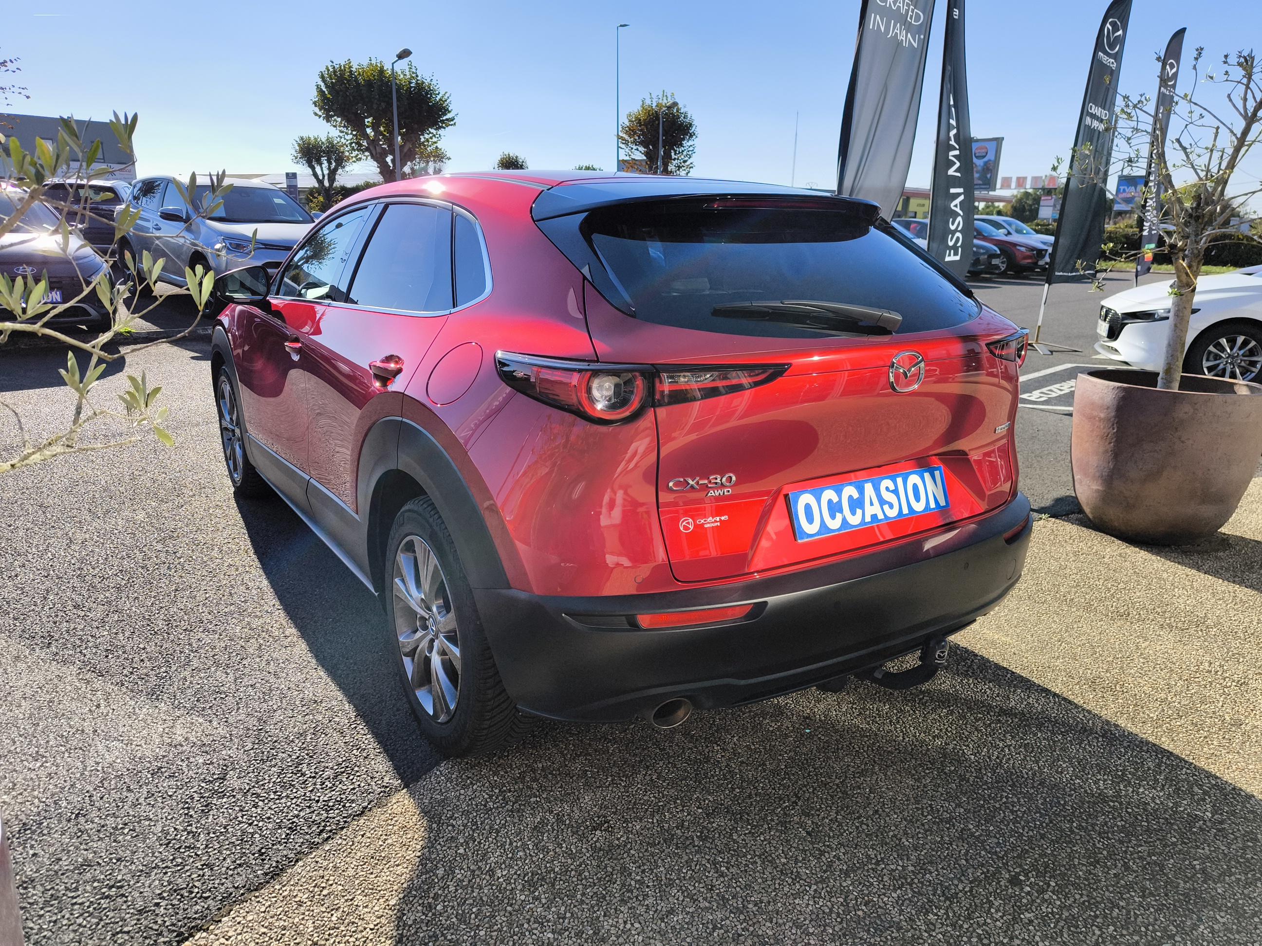 MAZDA CX-30 2.0L e-SKYACTIV X M Hybrid 186 ch 4x4 BVA6 Exclusive-Line - Véhicule Occasion - Océane Auto MAZDA CX-30 2.0L e-SKYACTIV X M Hybrid 186 ch 4x4 BVA6 Exclusive-Line - Véhicule Occasion Océane Auto