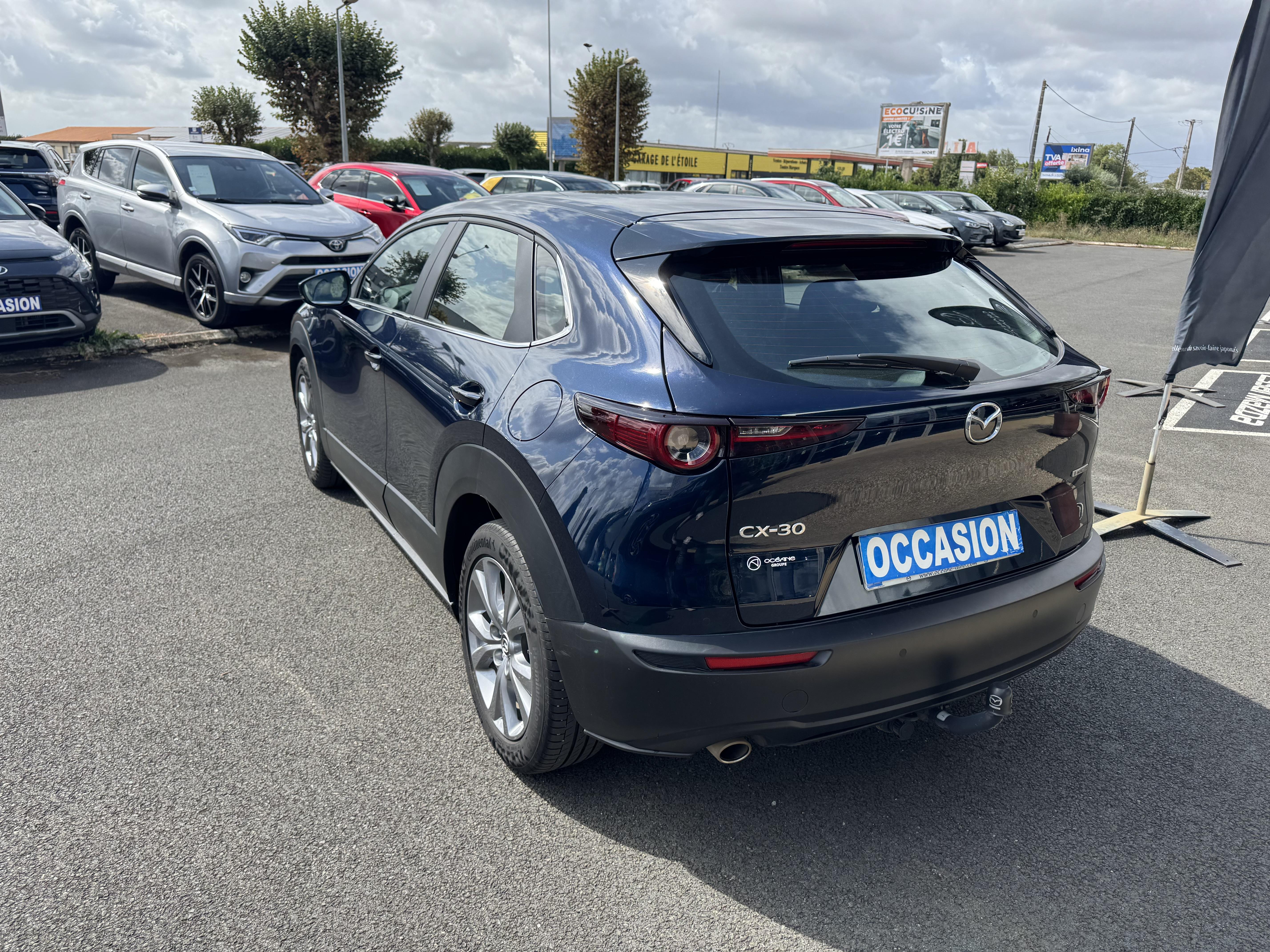MAZDA CX-30 2.0L e-SKYACTIV G M Hybrid 122 ch 4x2 BVA6 Style - Véhicule Occasion - Océane Auto MAZDA CX-30 2.0L e-SKYACTIV G M Hybrid 122 ch 4x2 BVA6 Style - Véhicule Occasion Océane Auto