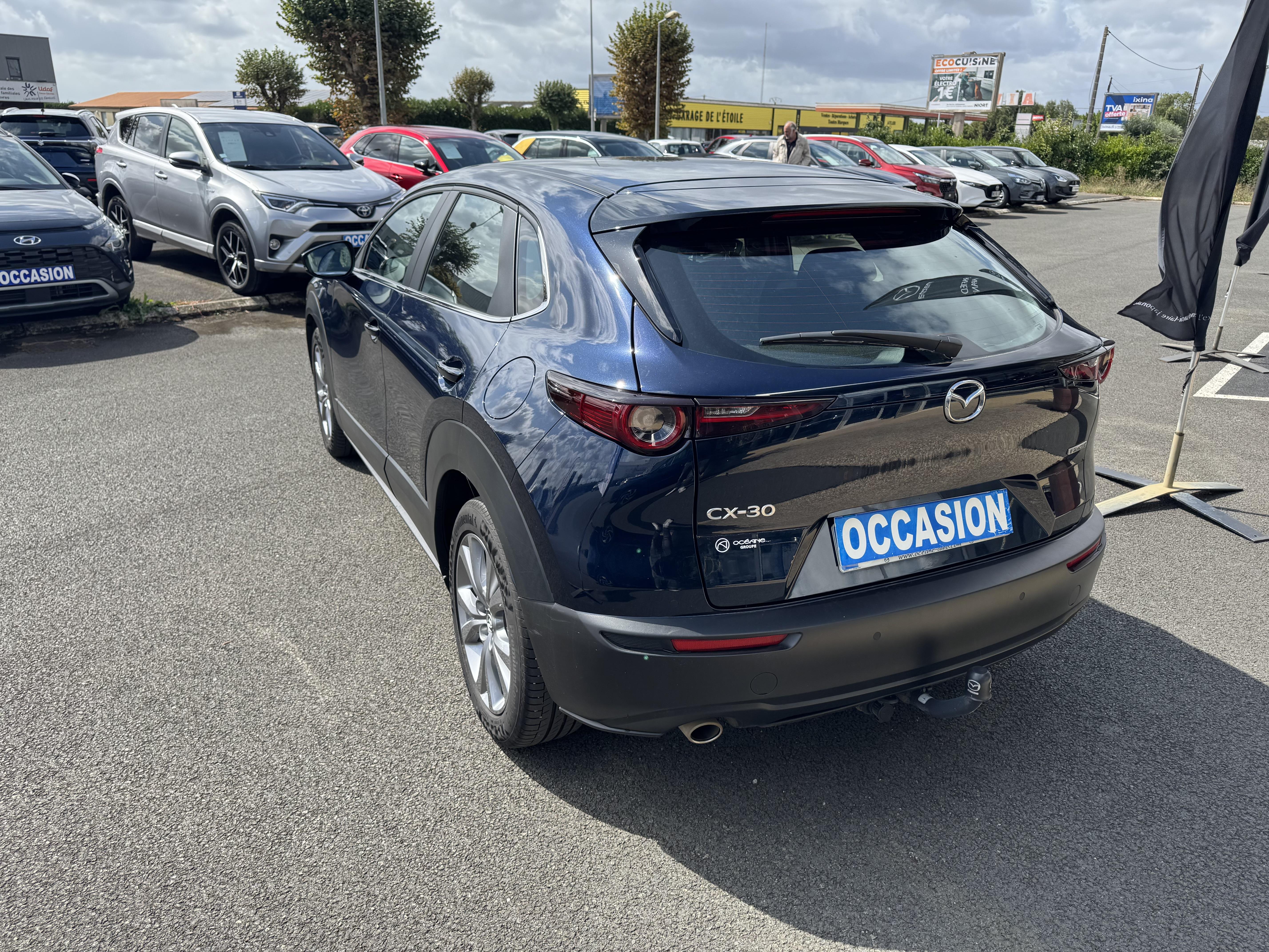 MAZDA CX-30 2.0L e-SKYACTIV G M Hybrid 122 ch 4x2 BVA6 Style - Véhicule Occasion - Océane Auto MAZDA CX-30 2.0L e-SKYACTIV G M Hybrid 122 ch 4x2 BVA6 Style - Véhicule Occasion Océane Auto