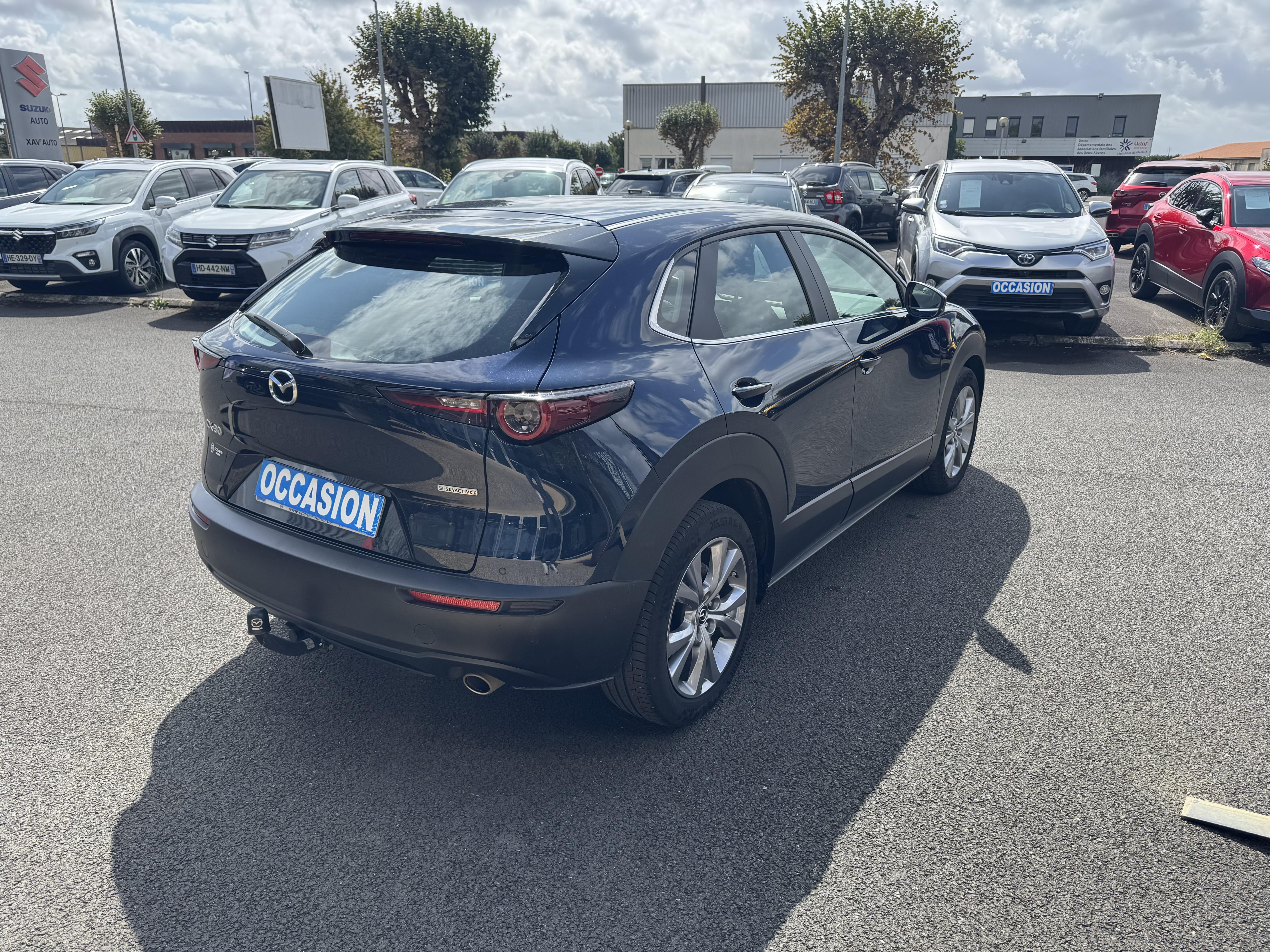 MAZDA CX-30 2.0L e-SKYACTIV G M Hybrid 122 ch 4x2 BVA6 Style - Véhicule Occasion - Océane Auto MAZDA CX-30 2.0L e-SKYACTIV G M Hybrid 122 ch 4x2 BVA6 Style - Véhicule Occasion Océane Auto