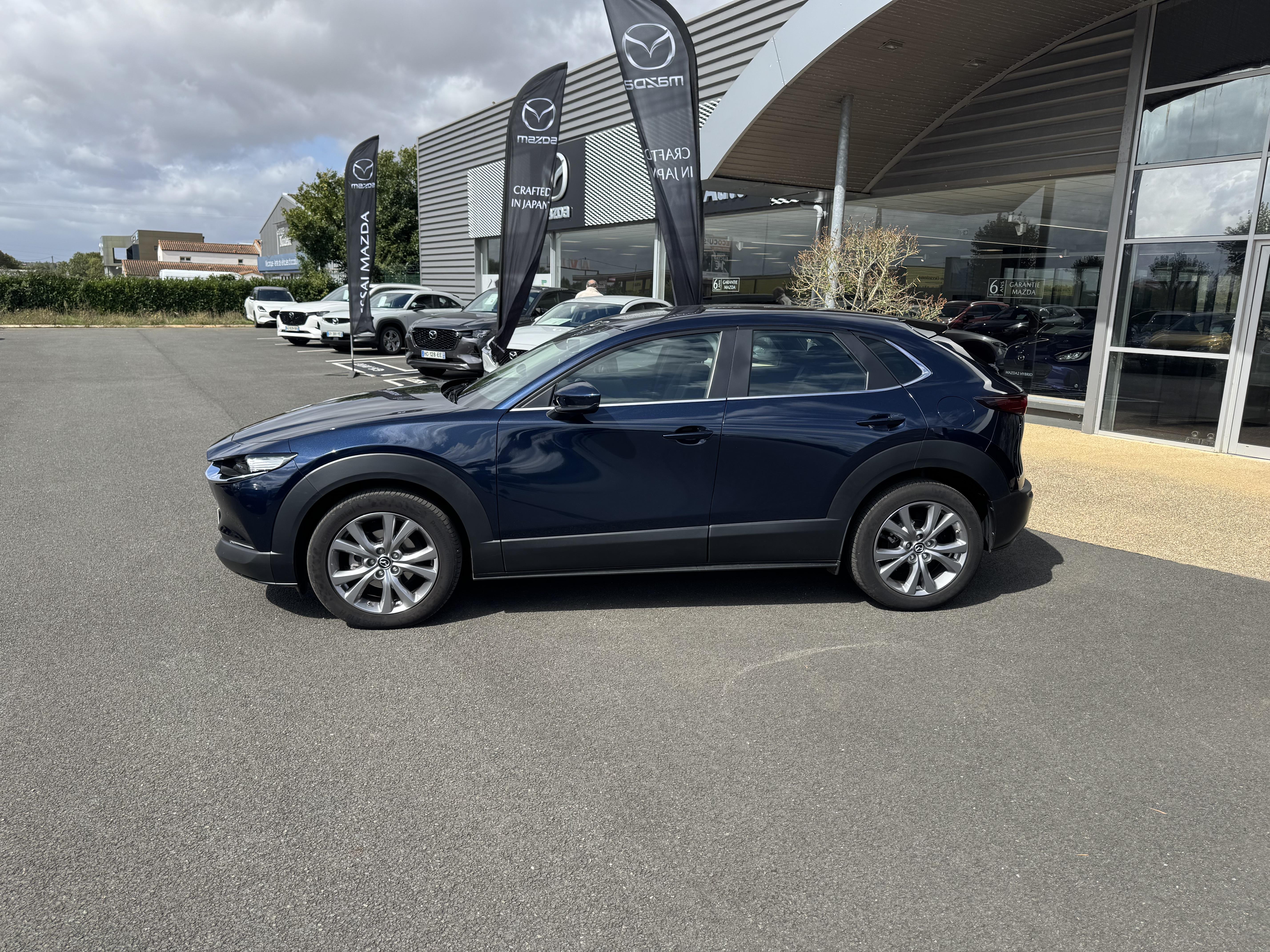 MAZDA CX-30 2.0L e-SKYACTIV G M Hybrid 122 ch 4x2 BVA6 Style - Véhicule Occasion - Océane Auto MAZDA CX-30 2.0L e-SKYACTIV G M Hybrid 122 ch 4x2 BVA6 Style - Véhicule Occasion Océane Auto