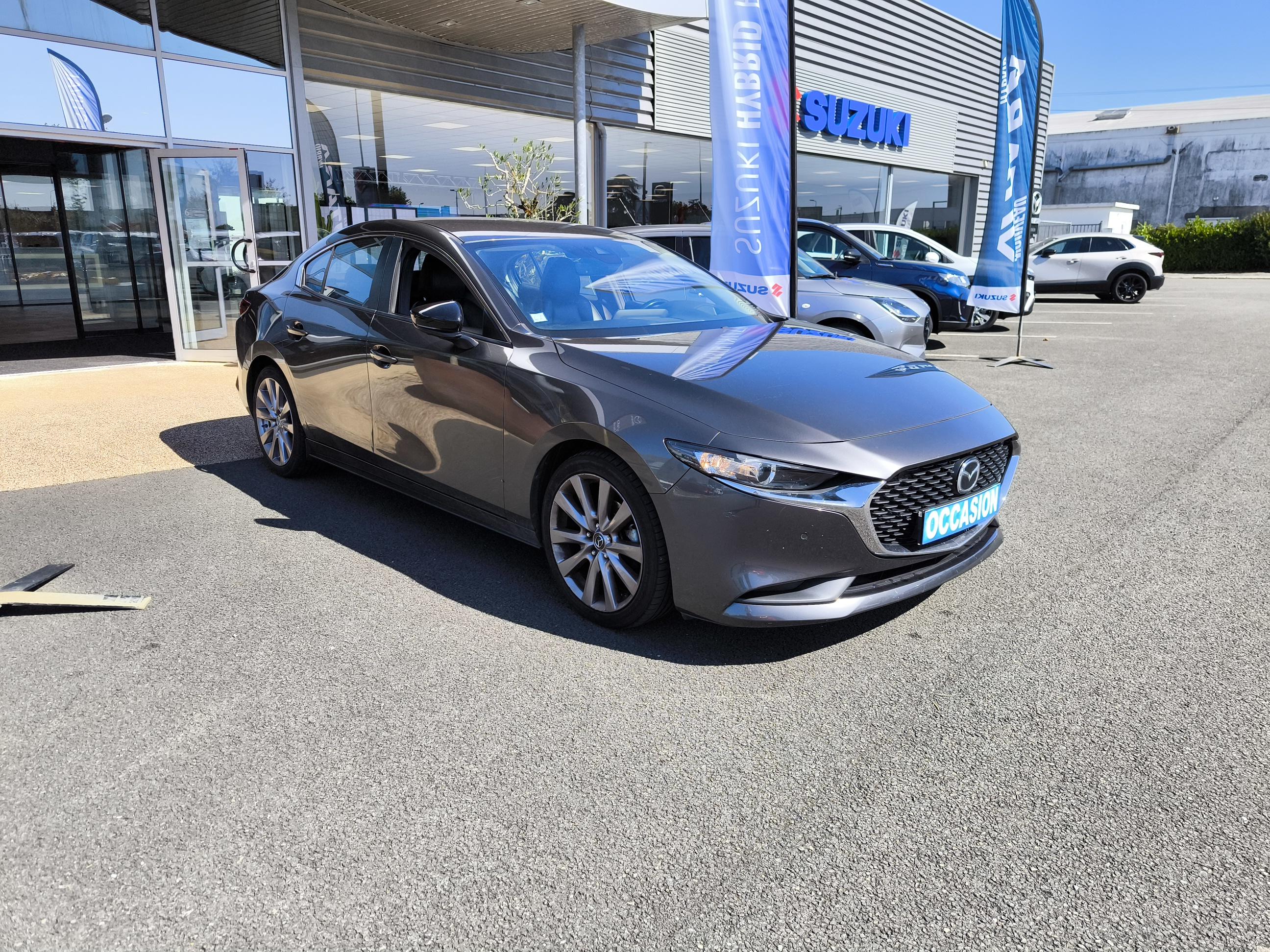 MAZDA Mazda3 Berline 2.0L SKYACTIV-G M Hybrid 122 ch BVA6 Inspiration - Véhicule Occasion - Océane Auto MAZDA Mazda3 Berline 2.0L SKYACTIV-G M Hybrid 122 ch BVA6 Inspiration - Véhicule Occasion Océane Auto