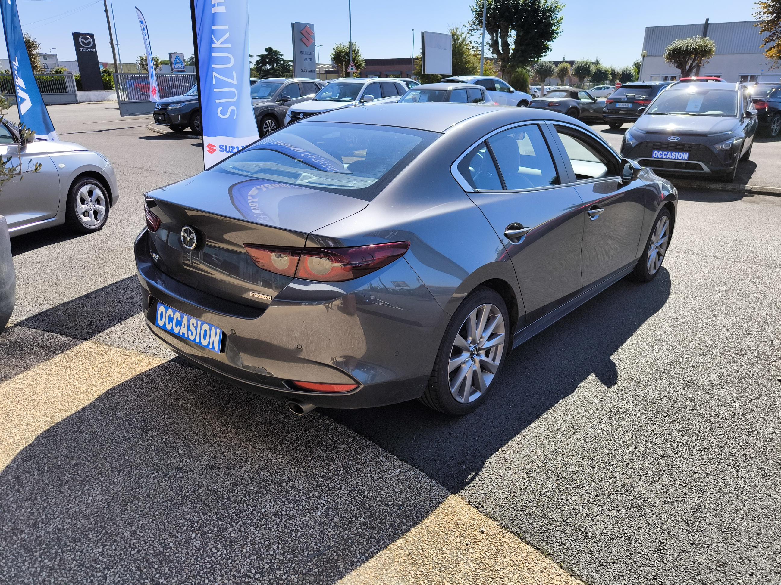 MAZDA Mazda3 Berline 2.0L SKYACTIV-G M Hybrid 122 ch BVA6 Inspiration - Véhicule Occasion - Océane Auto MAZDA Mazda3 Berline 2.0L SKYACTIV-G M Hybrid 122 ch BVA6 Inspiration - Véhicule Occasion Océane Auto