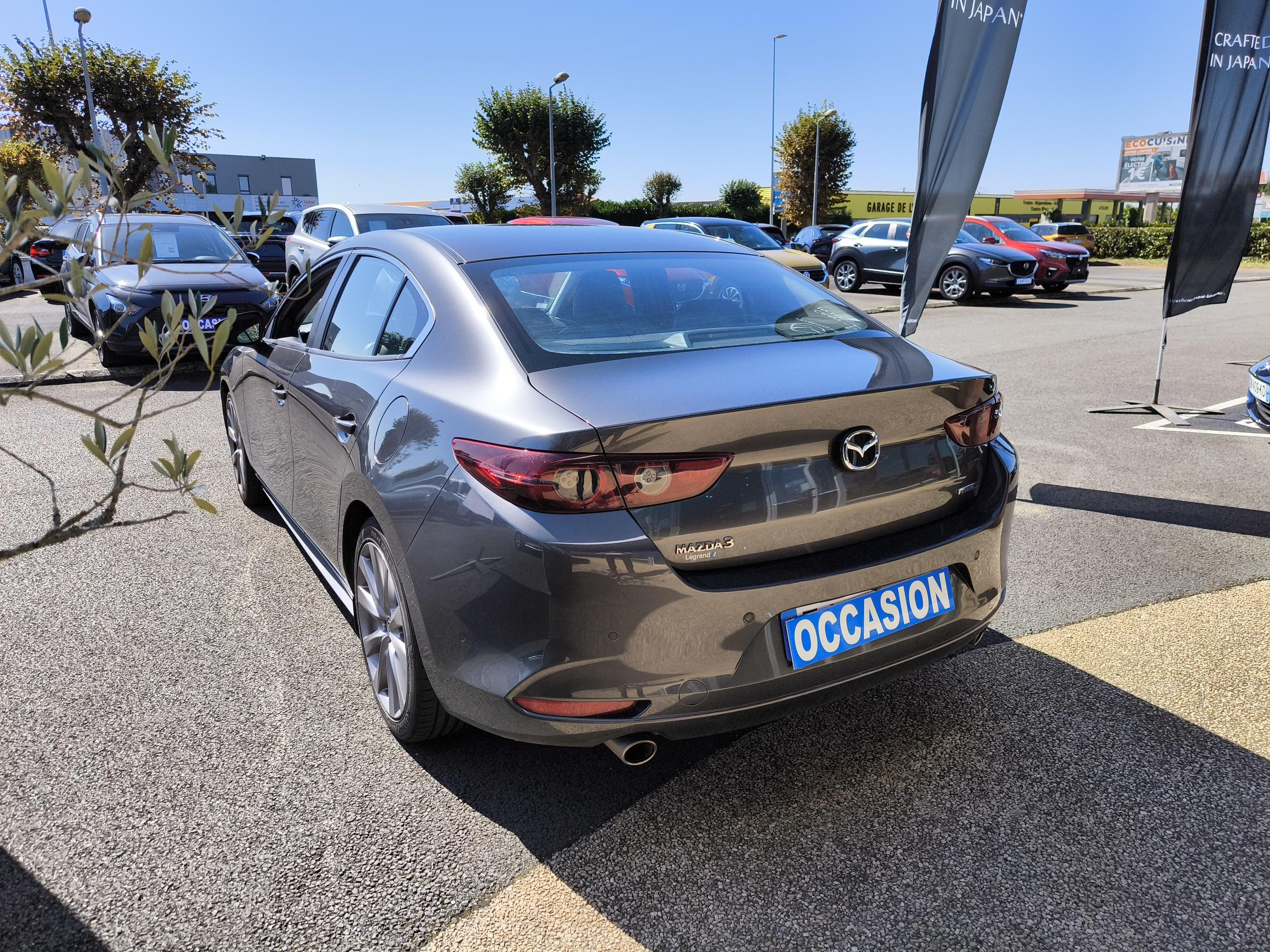 MAZDA Mazda3 Berline 2.0L SKYACTIV-G M Hybrid 122 ch BVA6 Inspiration - Véhicule Occasion - Océane Auto MAZDA Mazda3 Berline 2.0L SKYACTIV-G M Hybrid 122 ch BVA6 Inspiration - Véhicule Occasion Océane Auto