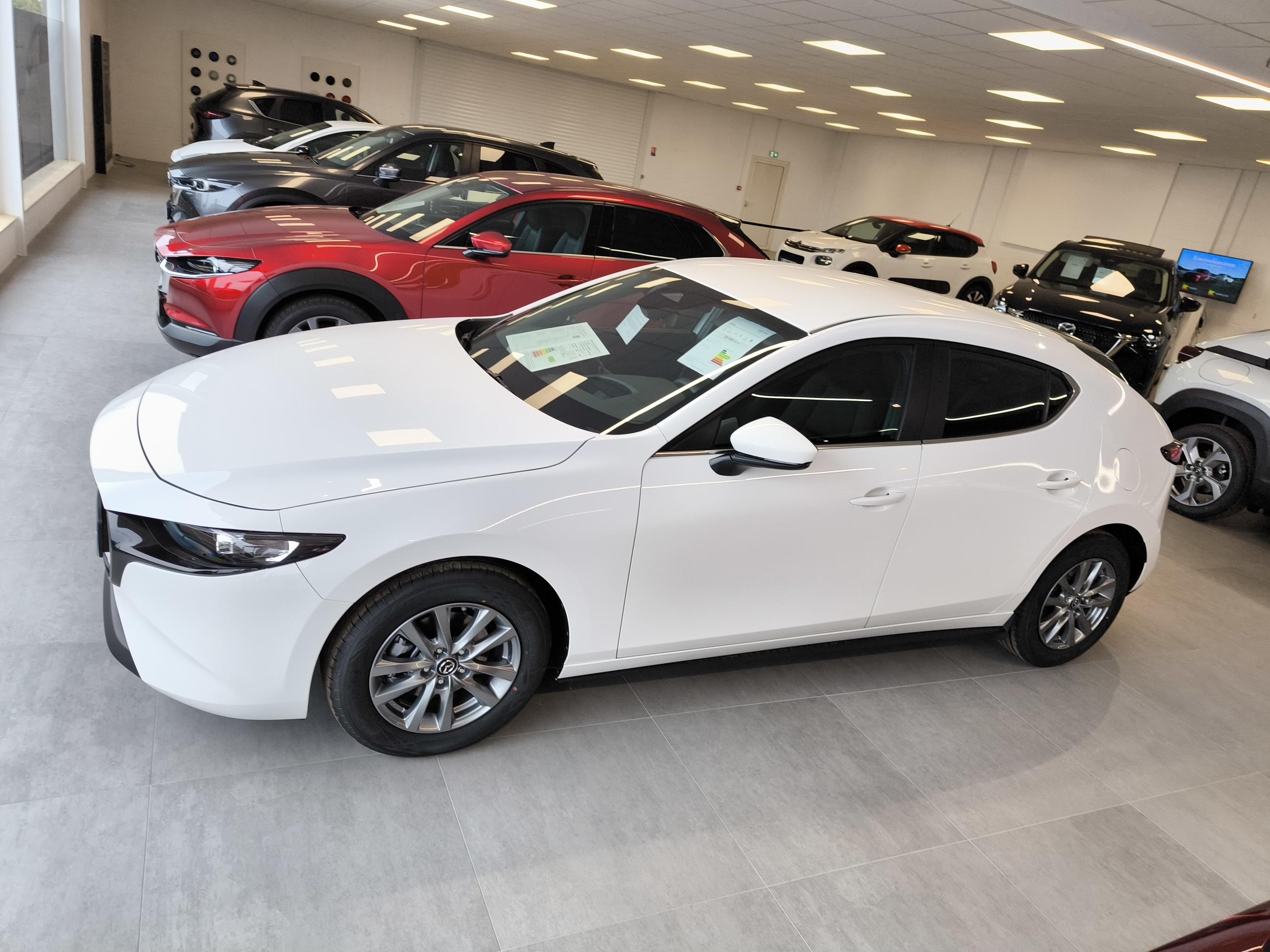 MAZDA Mazda3 5 portes 2.5L e-SKYACTIV-G M Hybrid 140 ch BVA6 Prime-Line - Véhicule Occasion - Océane Auto MAZDA Mazda3 5 portes 2.5L e-SKYACTIV-G M Hybrid 140 ch BVA6 Prime-Line - Véhicule Occasion Océane Auto