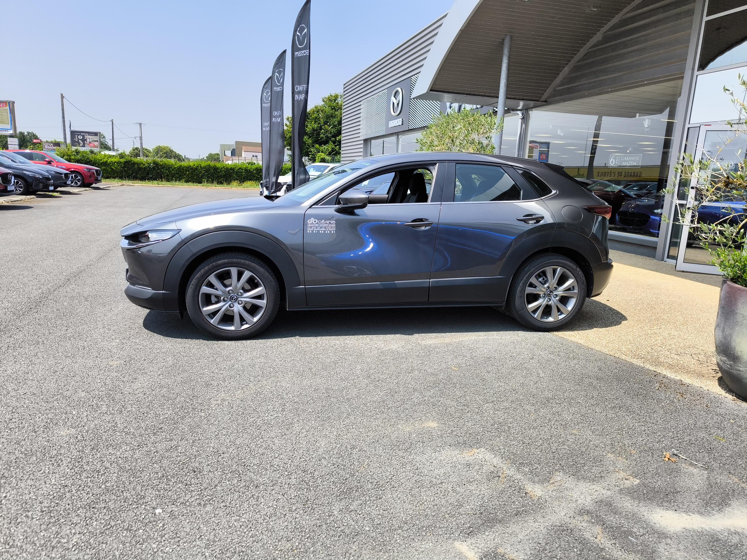 MAZDA CX-30 2.0L SKYACTIV-G M Hybrid 122 ch 4x2 BVA6 Style - Véhicule Occasion - Océane Auto MAZDA CX-30 2.0L SKYACTIV-G M Hybrid 122 ch 4x2 BVA6 Style - Véhicule Occasion Océane Auto