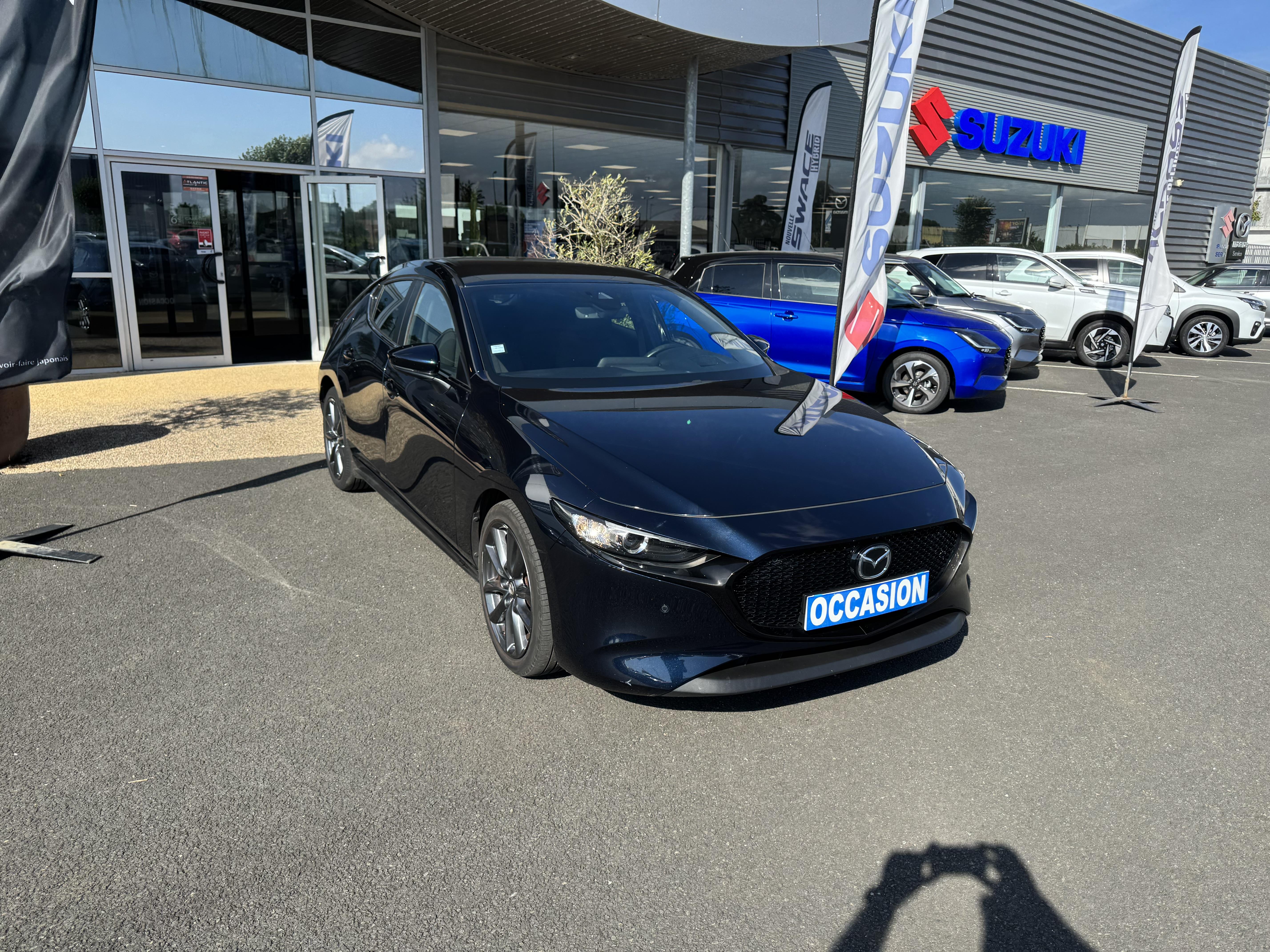 MAZDA Mazda3 5 portes 2.0L SKYACTIV-G M Hybrid 122 ch BVM6 Style - Véhicule Occasion - Océane Auto MAZDA Mazda3 5 portes 2.0L SKYACTIV-G M Hybrid 122 ch BVM6 Style - Véhicule Occasion Océane Auto