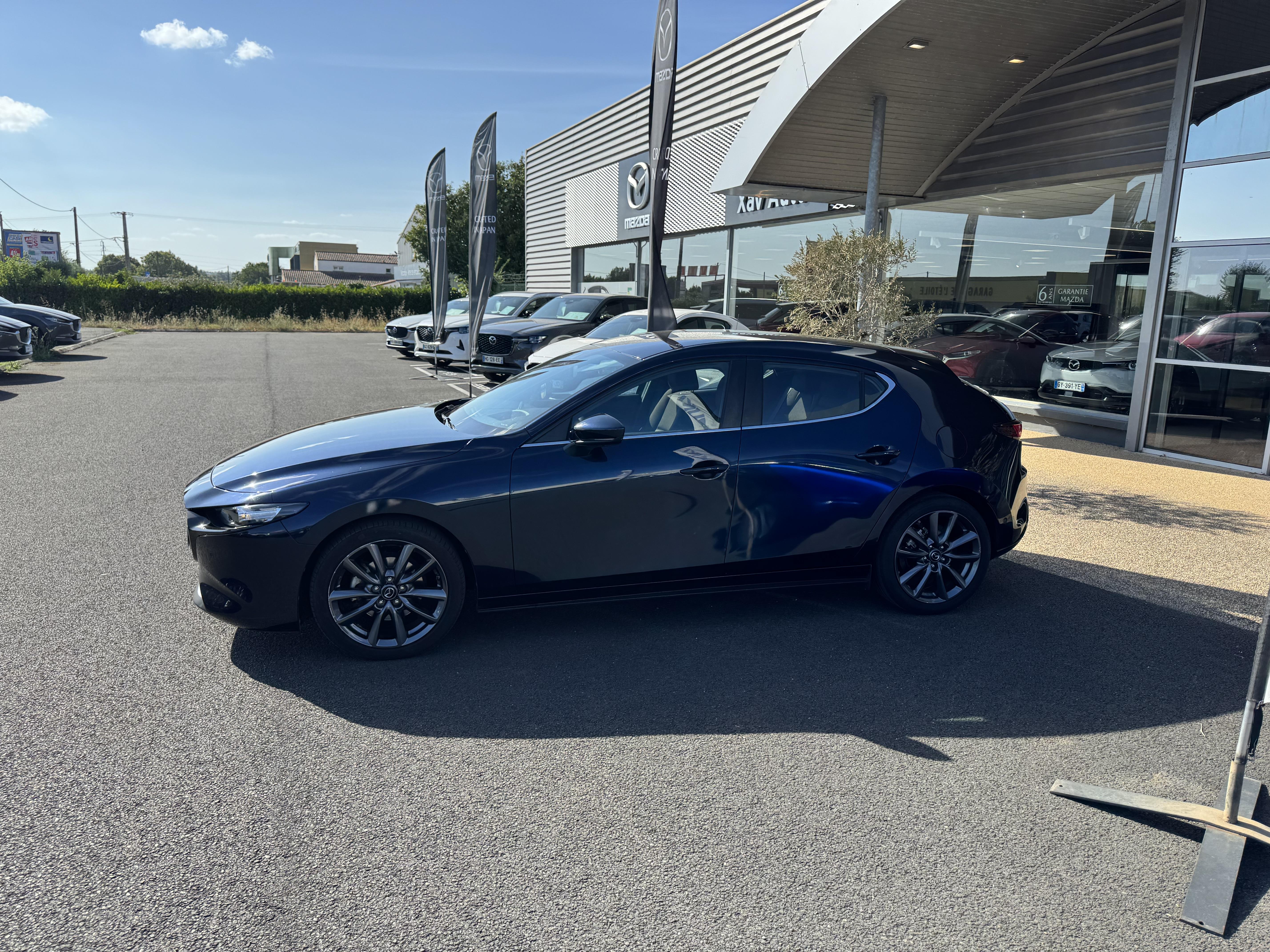 MAZDA Mazda3 5 portes 2.0L SKYACTIV-G M Hybrid 122 ch BVM6 Style - Véhicule Occasion - Océane Auto MAZDA Mazda3 5 portes 2.0L SKYACTIV-G M Hybrid 122 ch BVM6 Style - Véhicule Occasion Océane Auto