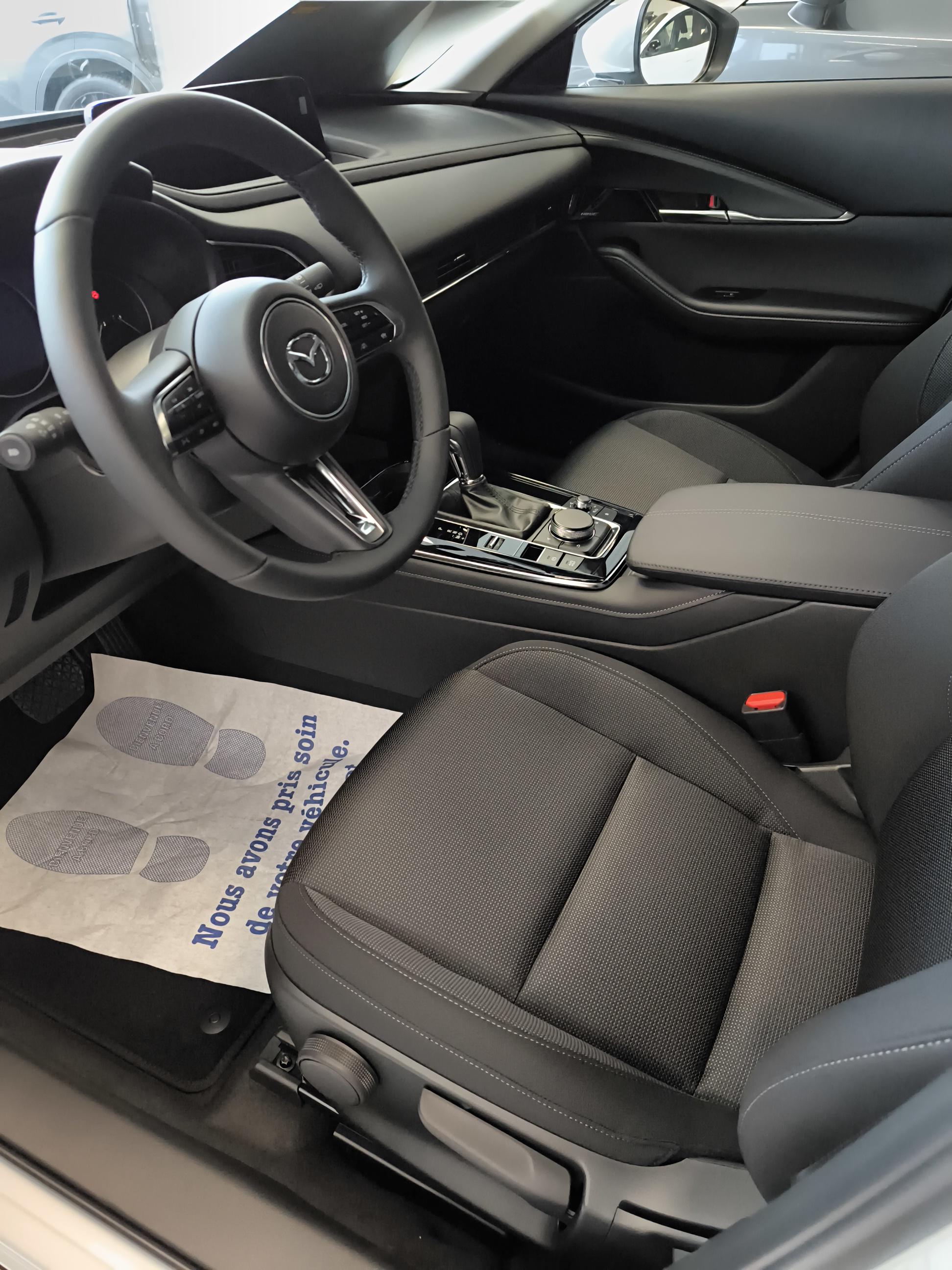 MAZDA CX-30 2.5L e-SKYACTIV G M Hybrid 140 ch 4x2 BVA6 Exclusive-Line - Véhicule Occasion - Océane Auto MAZDA CX-30 2.5L e-SKYACTIV G M Hybrid 140 ch 4x2 BVA6 Exclusive-Line - Véhicule Occasion Océane Auto