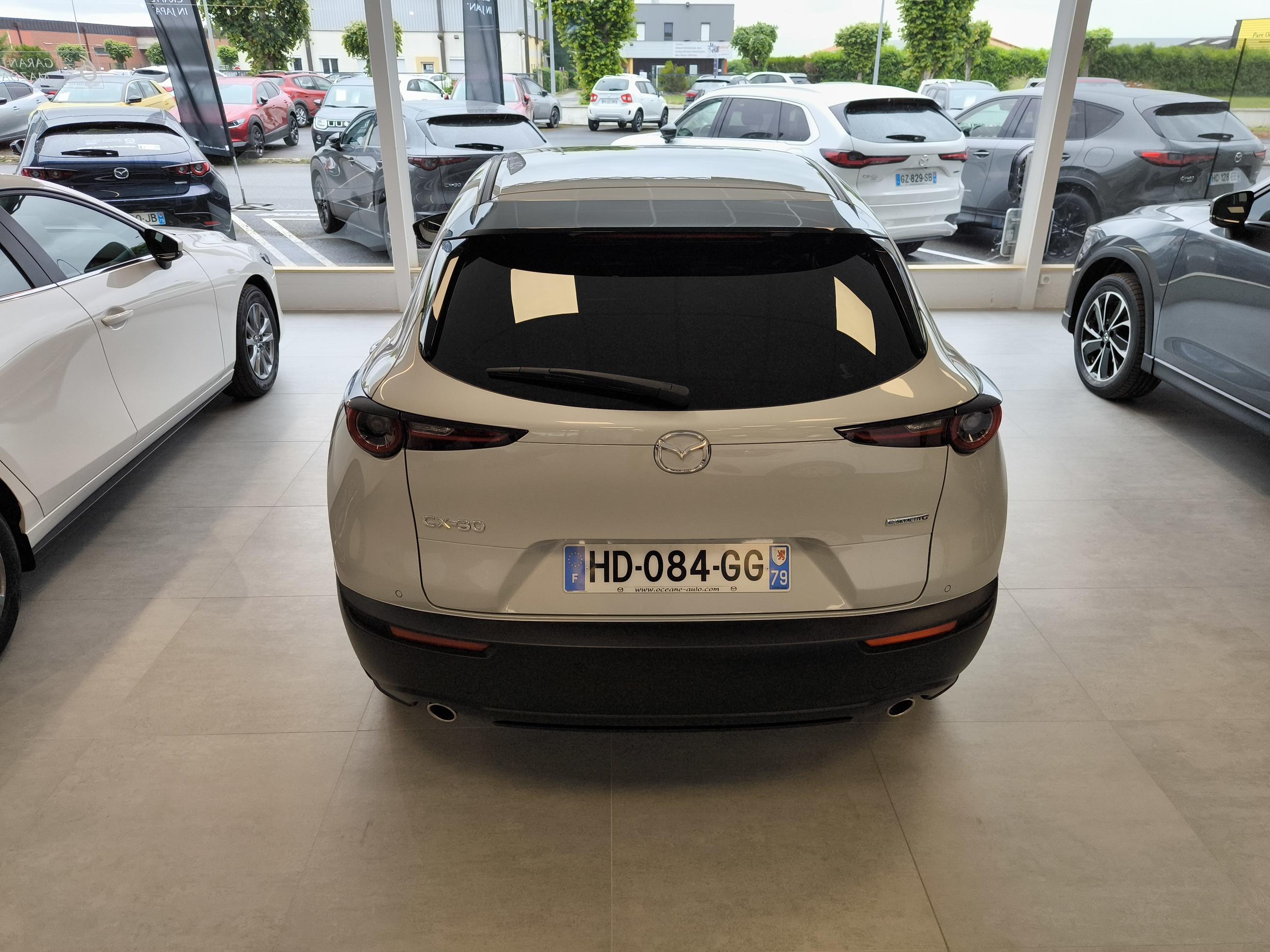 MAZDA CX-30 2.5L e-SKYACTIV G M Hybrid 140 ch 4x2 BVA6 Exclusive-Line - Véhicule Occasion - Océane Auto MAZDA CX-30 2.5L e-SKYACTIV G M Hybrid 140 ch 4x2 BVA6 Exclusive-Line - Véhicule Occasion Océane Auto