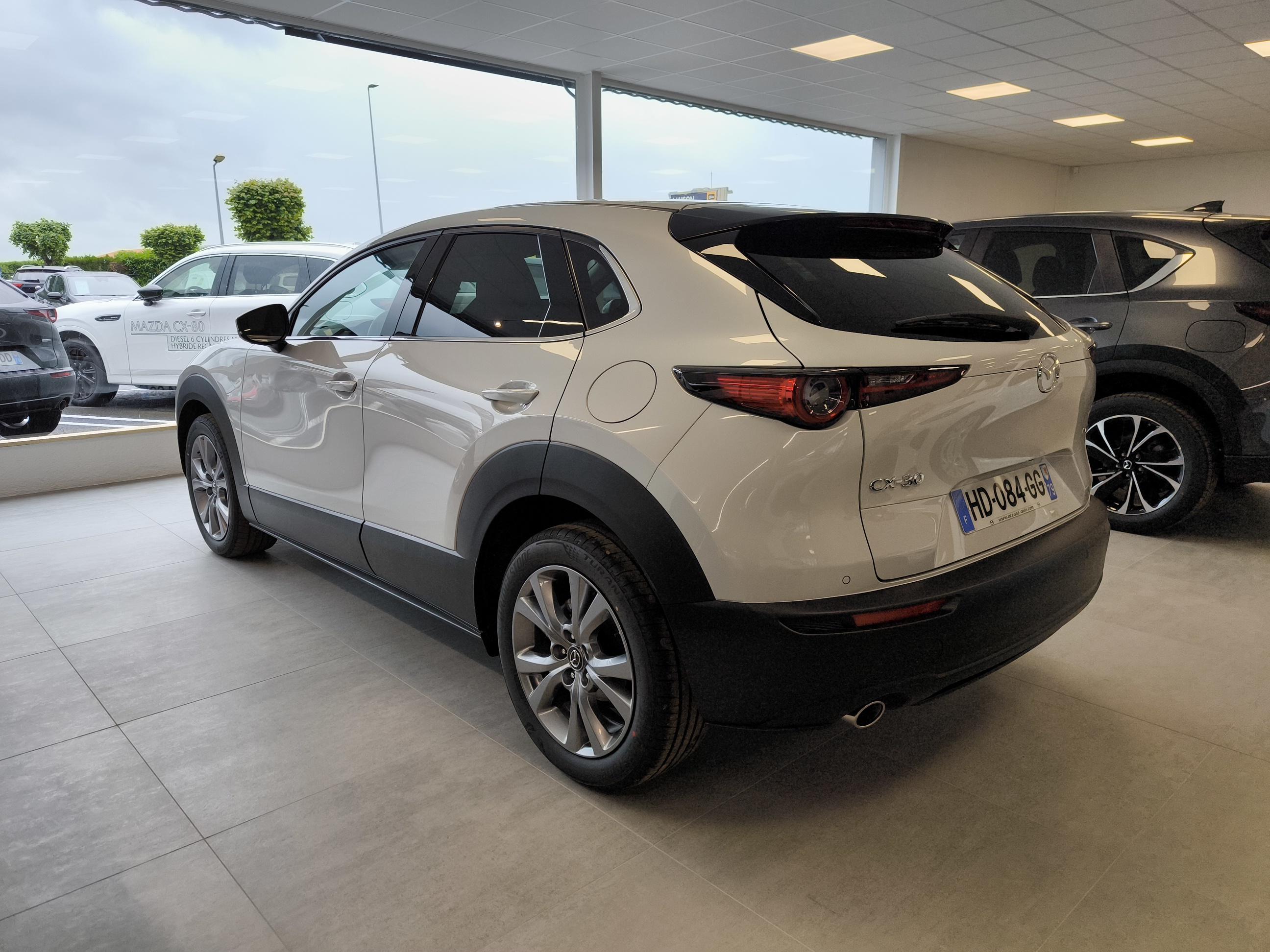 MAZDA CX-30 2.5L e-SKYACTIV G M Hybrid 140 ch 4x2 BVA6 Exclusive-Line - Véhicule Occasion - Océane Auto MAZDA CX-30 2.5L e-SKYACTIV G M Hybrid 140 ch 4x2 BVA6 Exclusive-Line - Véhicule Occasion Océane Auto