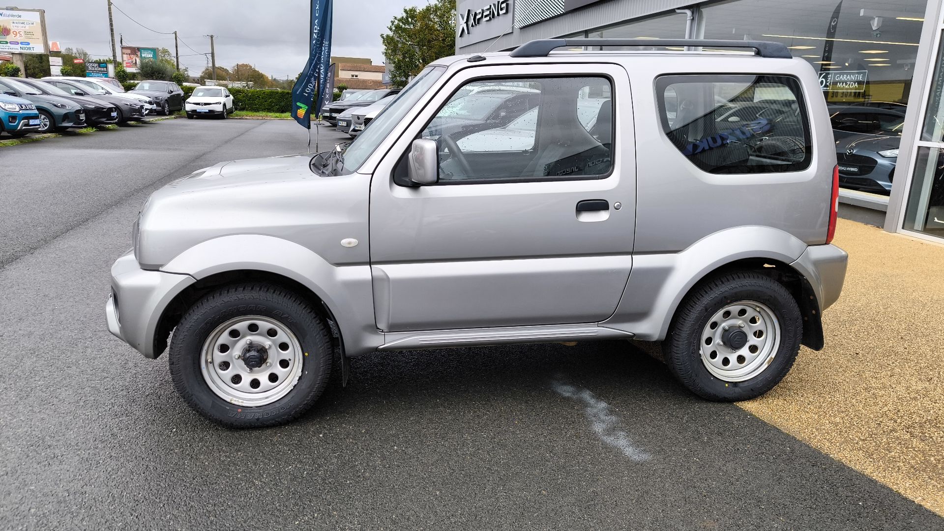 SUZUKI Jimny 1.3i VVT JLX A - Véhicule Occasion - Océane Auto SUZUKI Jimny 1.3i VVT JLX A - Véhicule Occasion Océane Auto