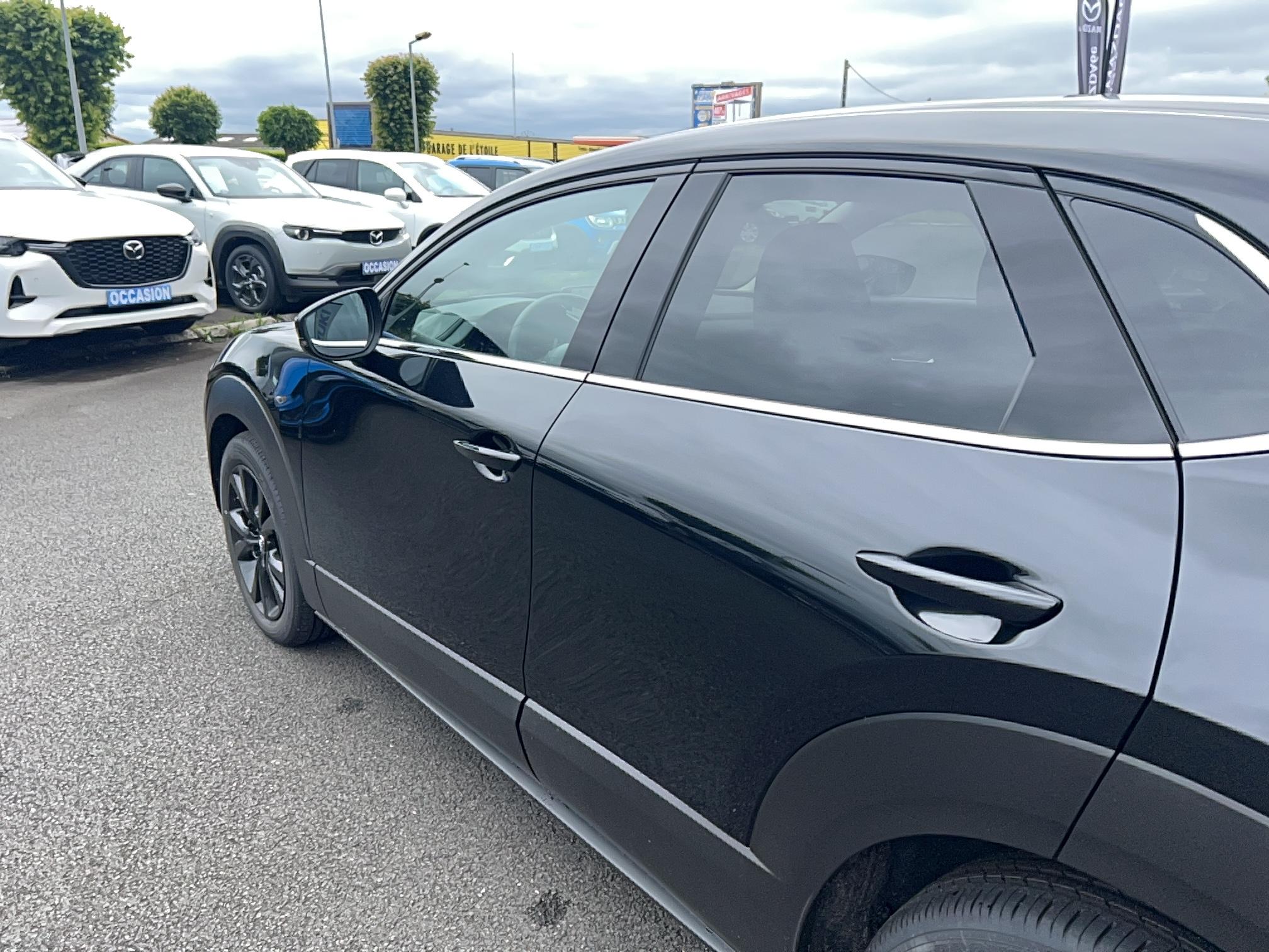 MAZDA CX-30 2.0L e-SKYACTIV X M Hybrid 186 ch 4x2 BVA6 Homura - Véhicule Occasion - Océane Auto MAZDA CX-30 2.0L e-SKYACTIV X M Hybrid 186 ch 4x2 BVA6 Homura - Véhicule Occasion Océane Auto