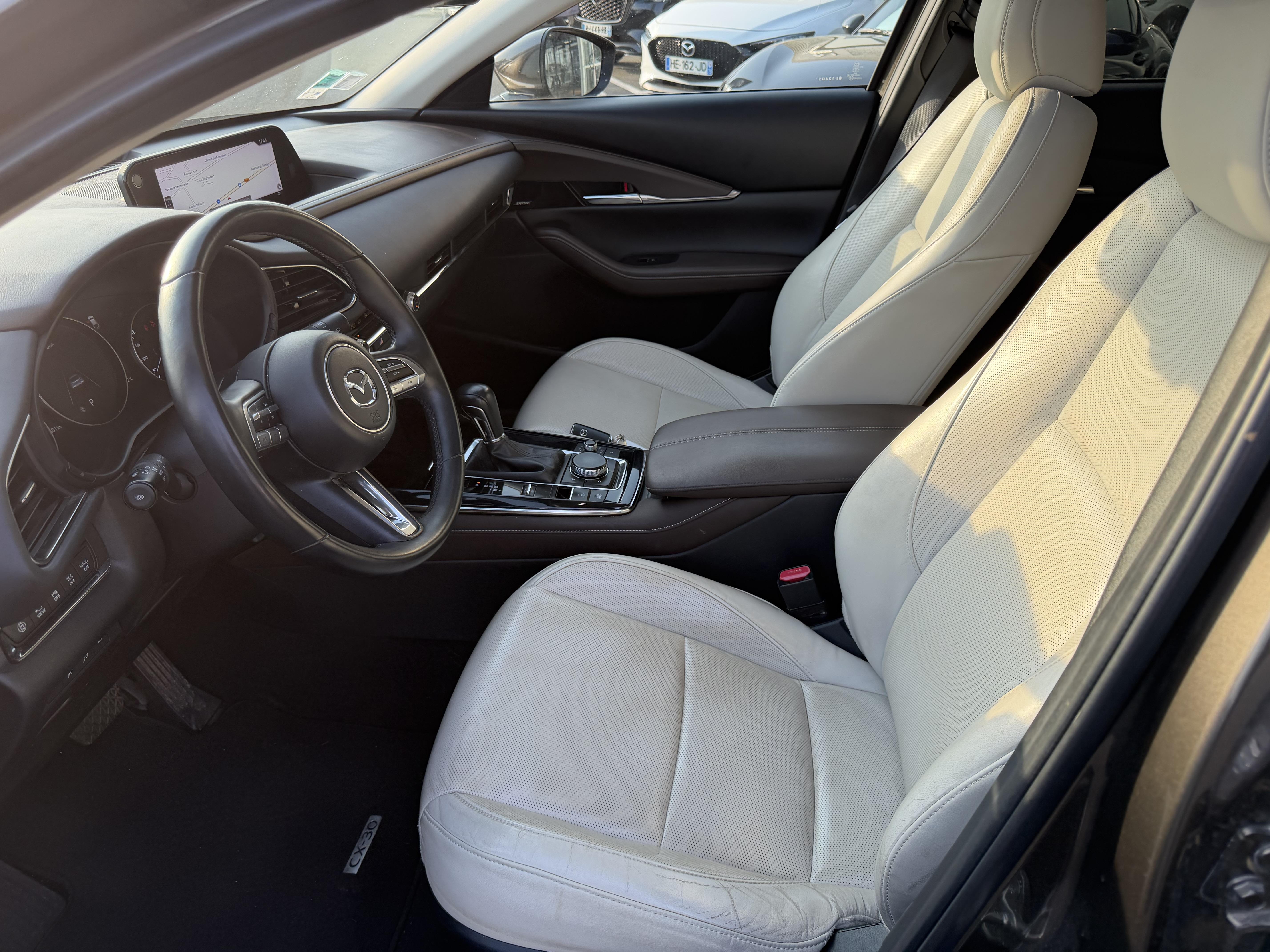 MAZDA CX-30 2.0L SKYACTIV-X M Hybrid 180 ch 4x4 BVA6 Exclusive - Véhicule Occasion - Océane Auto MAZDA CX-30 2.0L SKYACTIV-X M Hybrid 180 ch 4x4 BVA6 Exclusive - Véhicule Occasion Océane Auto