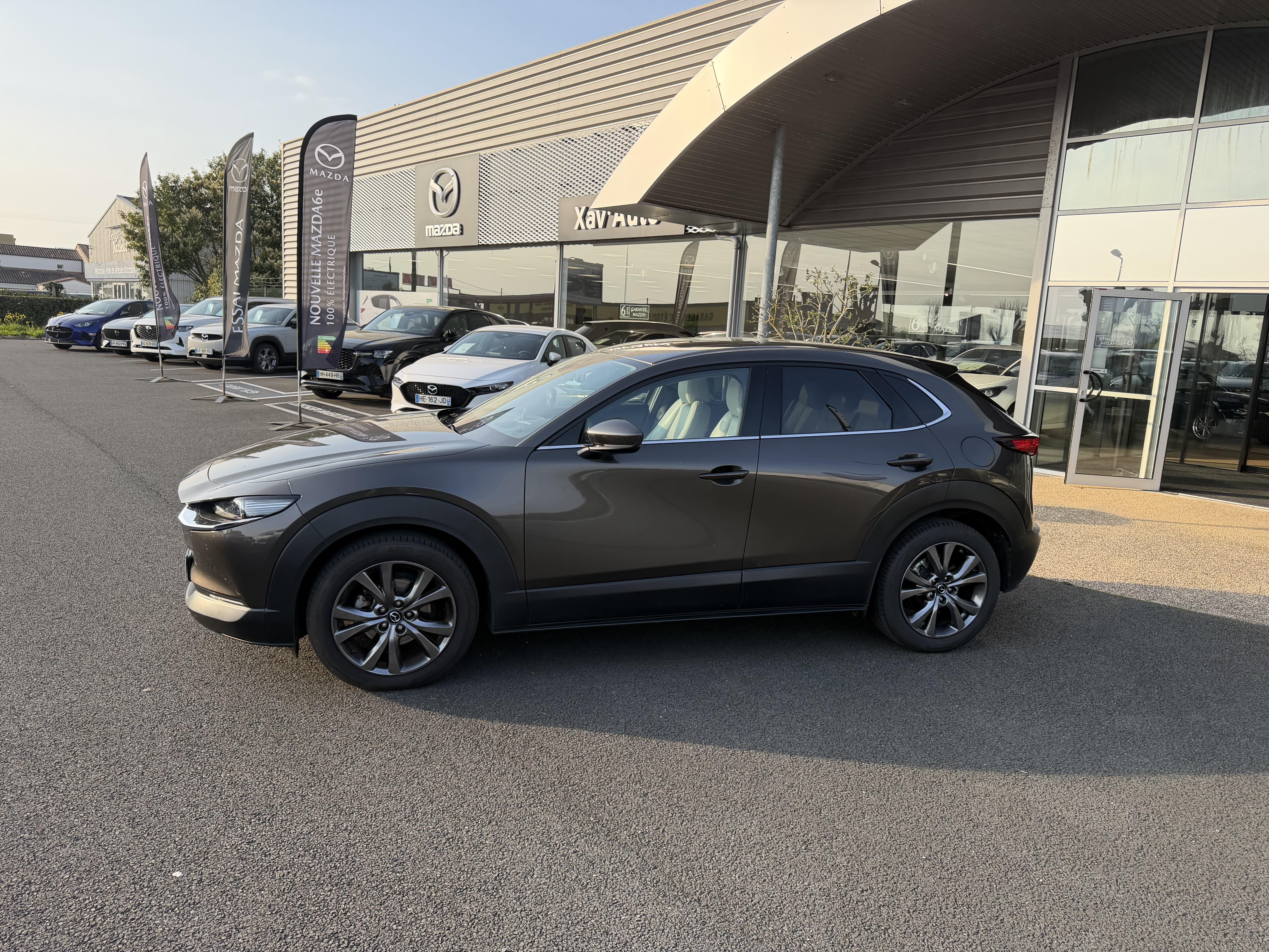 MAZDA CX-30 2.0L SKYACTIV-X M Hybrid 180 ch 4x4 BVA6 Exclusive - Véhicule Occasion - Océane Auto MAZDA CX-30 2.0L SKYACTIV-X M Hybrid 180 ch 4x4 BVA6 Exclusive - Véhicule Occasion Océane Auto