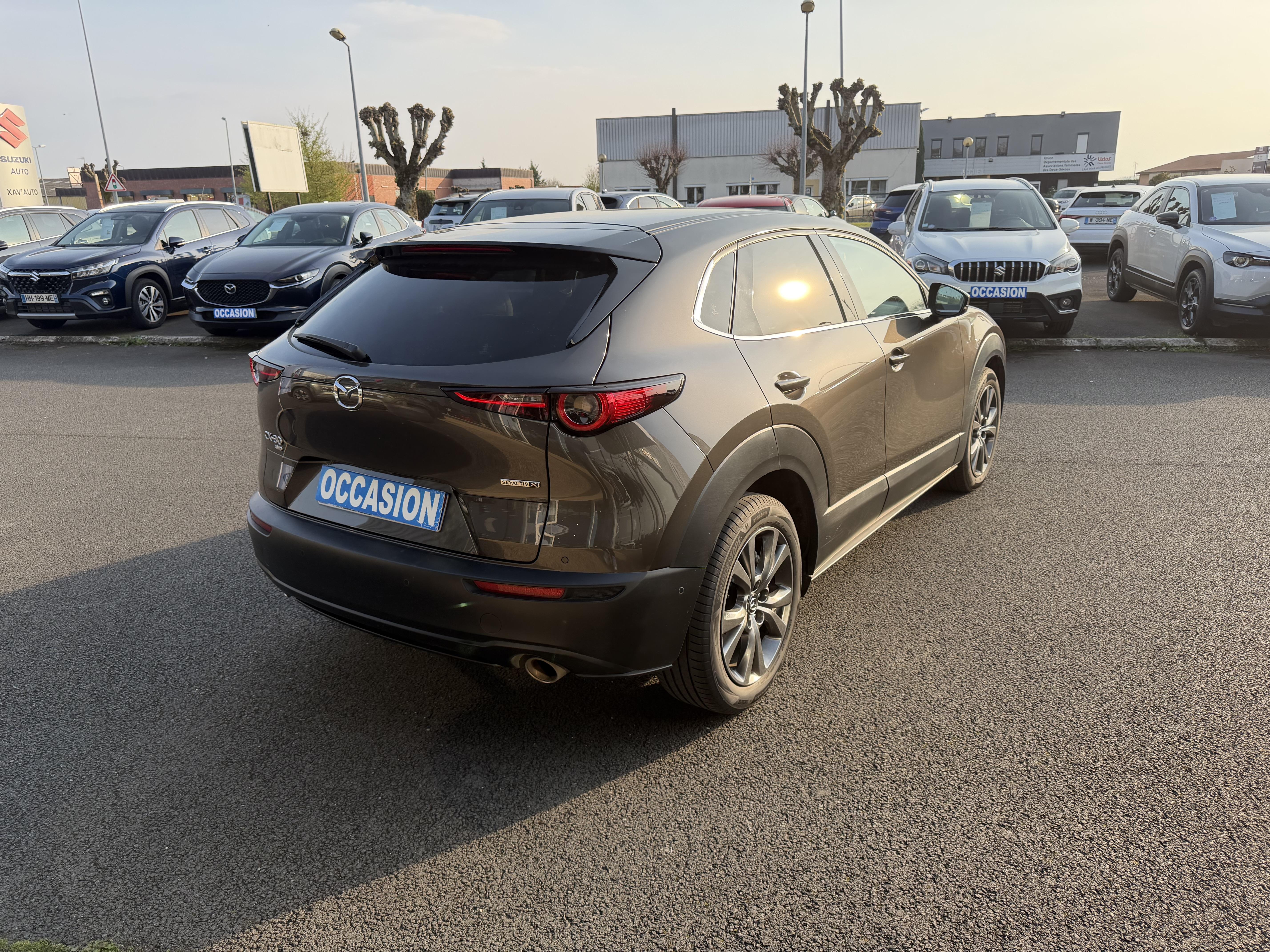 MAZDA CX-30 2.0L SKYACTIV-X M Hybrid 180 ch 4x4 BVA6 Exclusive - Véhicule Occasion - Océane Auto MAZDA CX-30 2.0L SKYACTIV-X M Hybrid 180 ch 4x4 BVA6 Exclusive - Véhicule Occasion Océane Auto