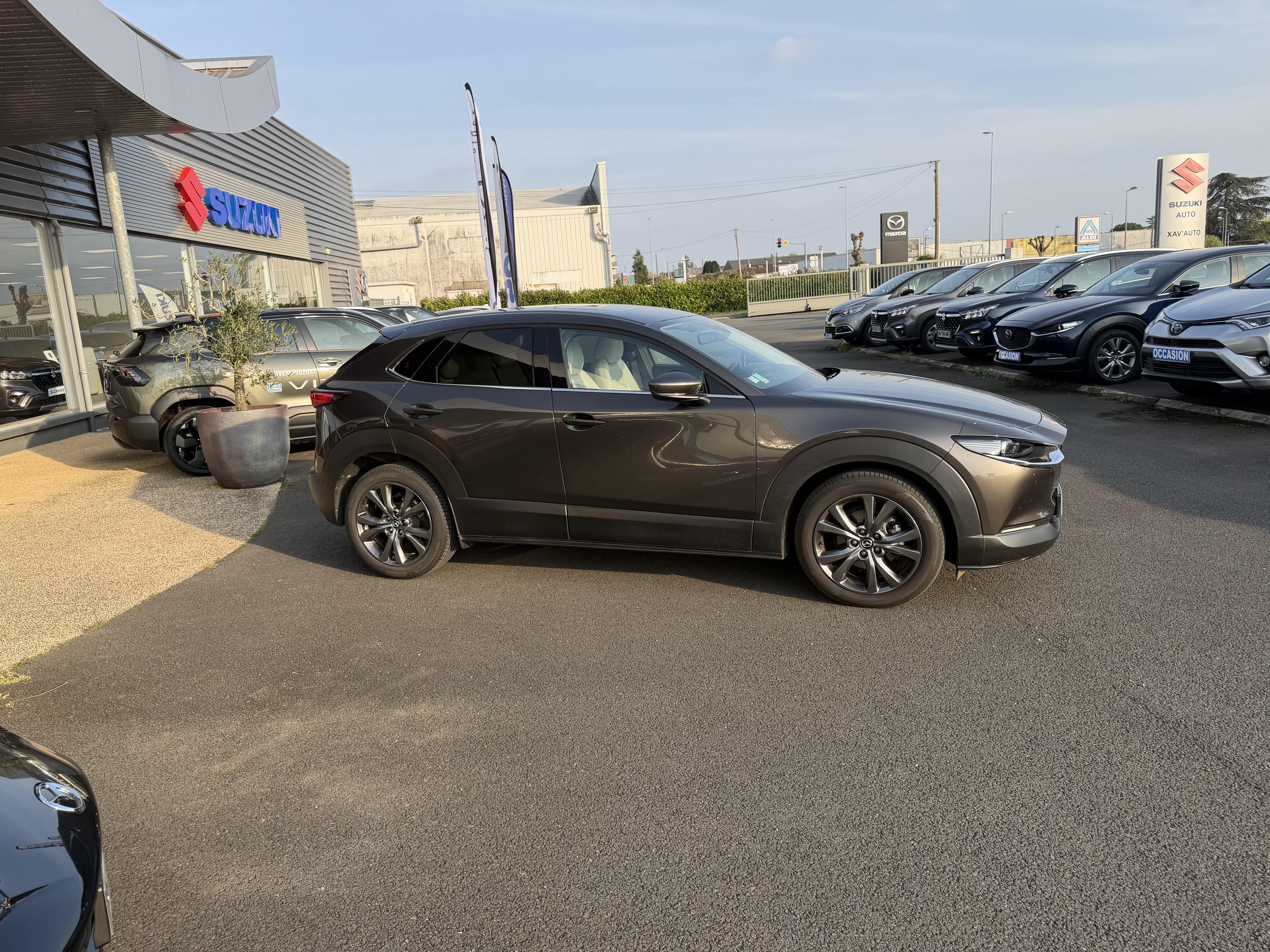 MAZDA CX-30 2.0L SKYACTIV-X M Hybrid 180 ch 4x4 BVA6 Exclusive - Véhicule Occasion - Océane Auto MAZDA CX-30 2.0L SKYACTIV-X M Hybrid 180 ch 4x4 BVA6 Exclusive - Véhicule Occasion Océane Auto