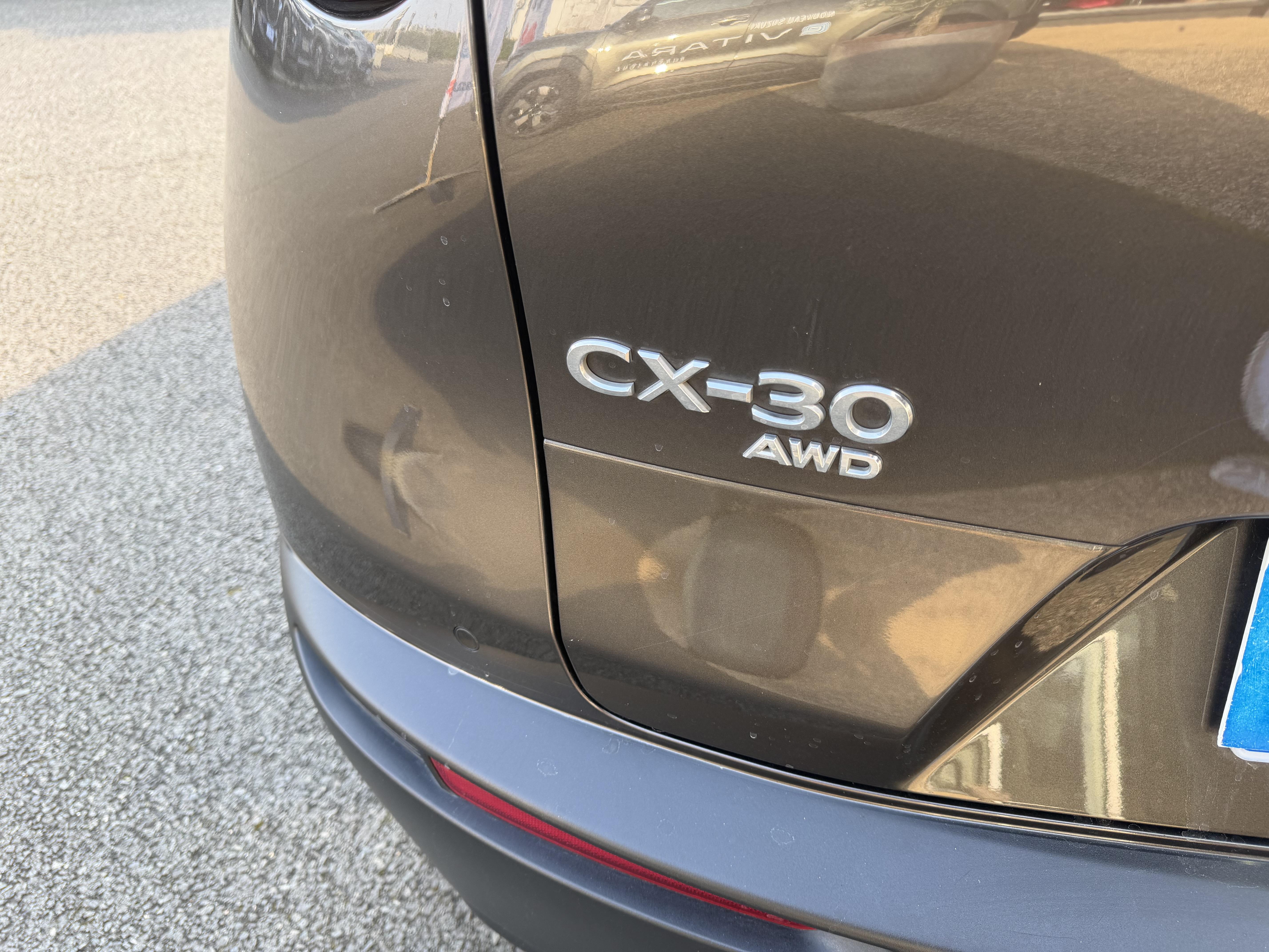 MAZDA CX-30 2.0L SKYACTIV-X M Hybrid 180 ch 4x4 BVA6 Exclusive - Véhicule Occasion - Océane Auto MAZDA CX-30 2.0L SKYACTIV-X M Hybrid 180 ch 4x4 BVA6 Exclusive - Véhicule Occasion Océane Auto