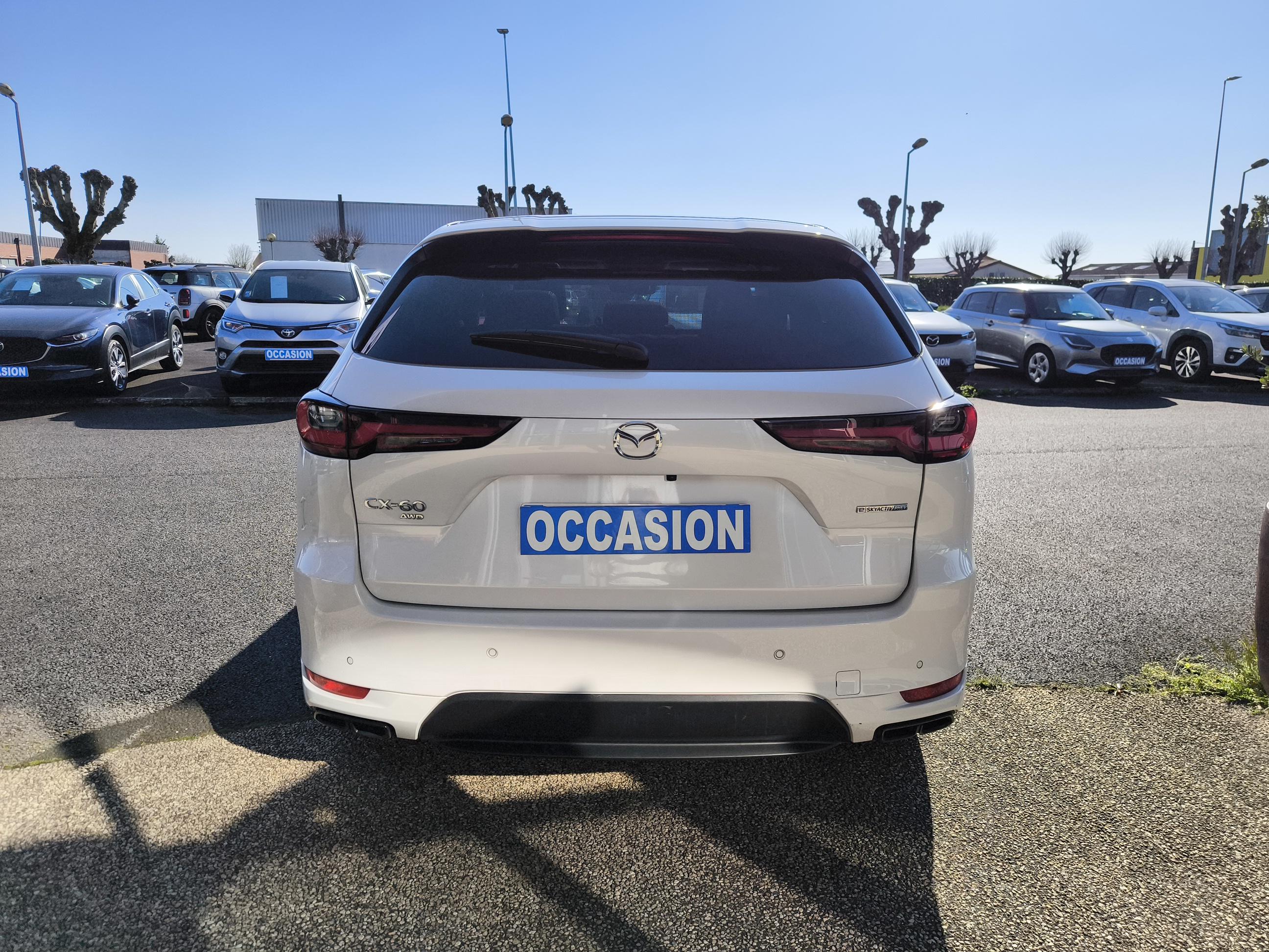 MAZDA CX-60 2.5L e-SKYACTIV PHEV 327 ch 4x4 BVA8 Homura - Véhicule Occasion - Océane Auto MAZDA CX-60 2.5L e-SKYACTIV PHEV 327 ch 4x4 BVA8 Homura - Véhicule Occasion Océane Auto